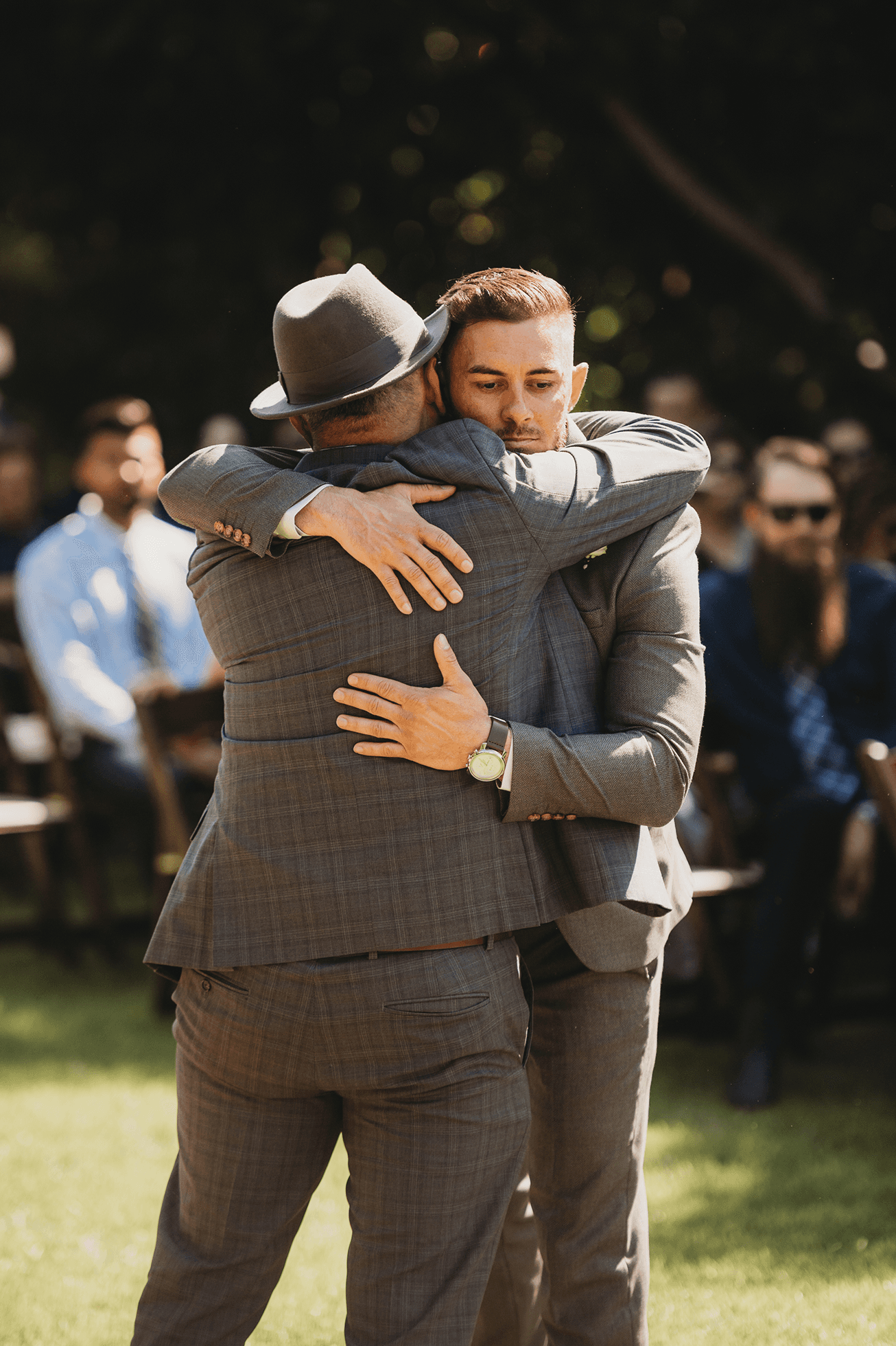 Flat lay wedding details with bouquet, rings, and sparkling bridal heels