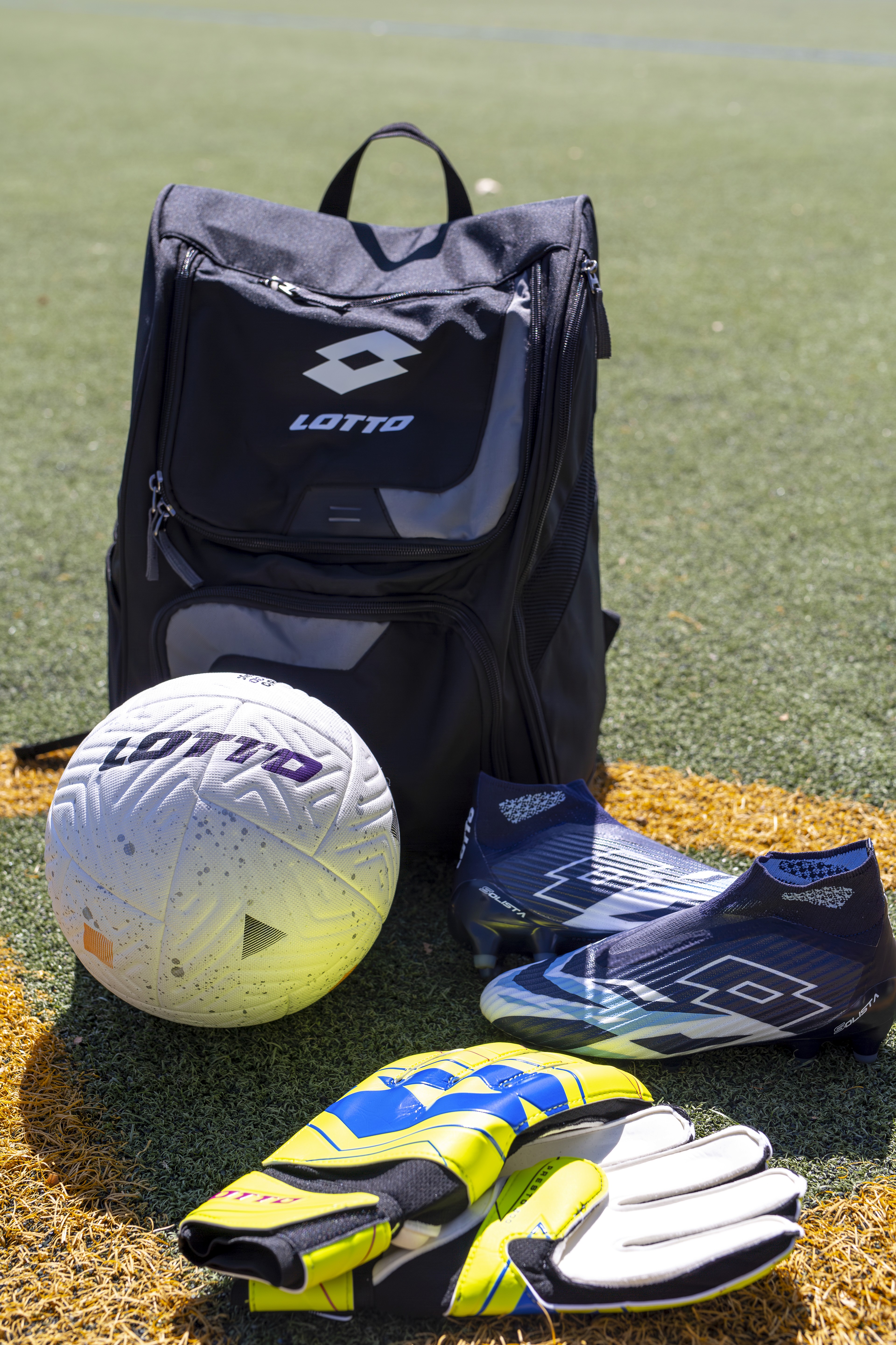 Lotto Sport soccer ball, backpack, goalie gloves, and Solista 100 VI Gravity