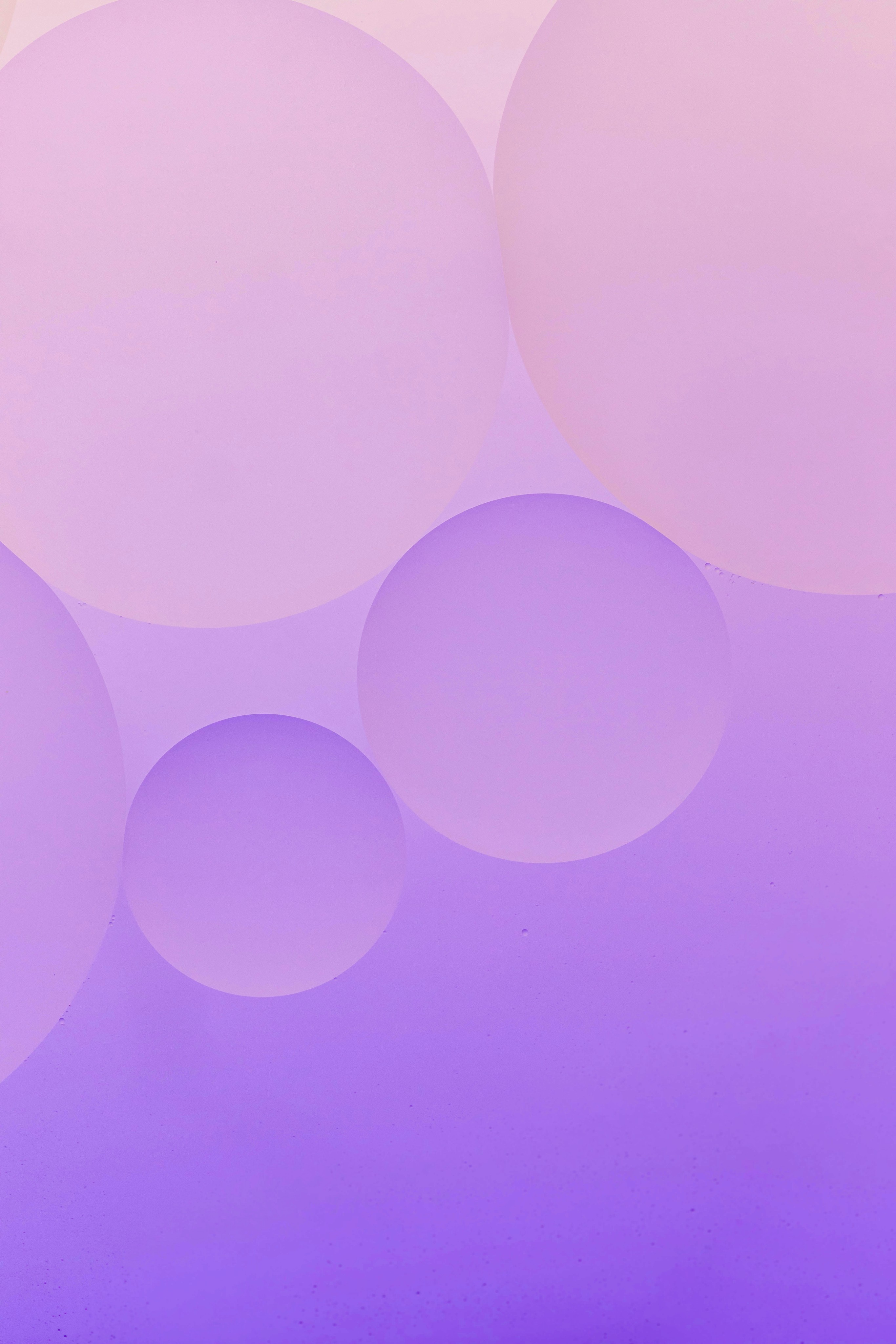 a close up of a cell phone on a purple background