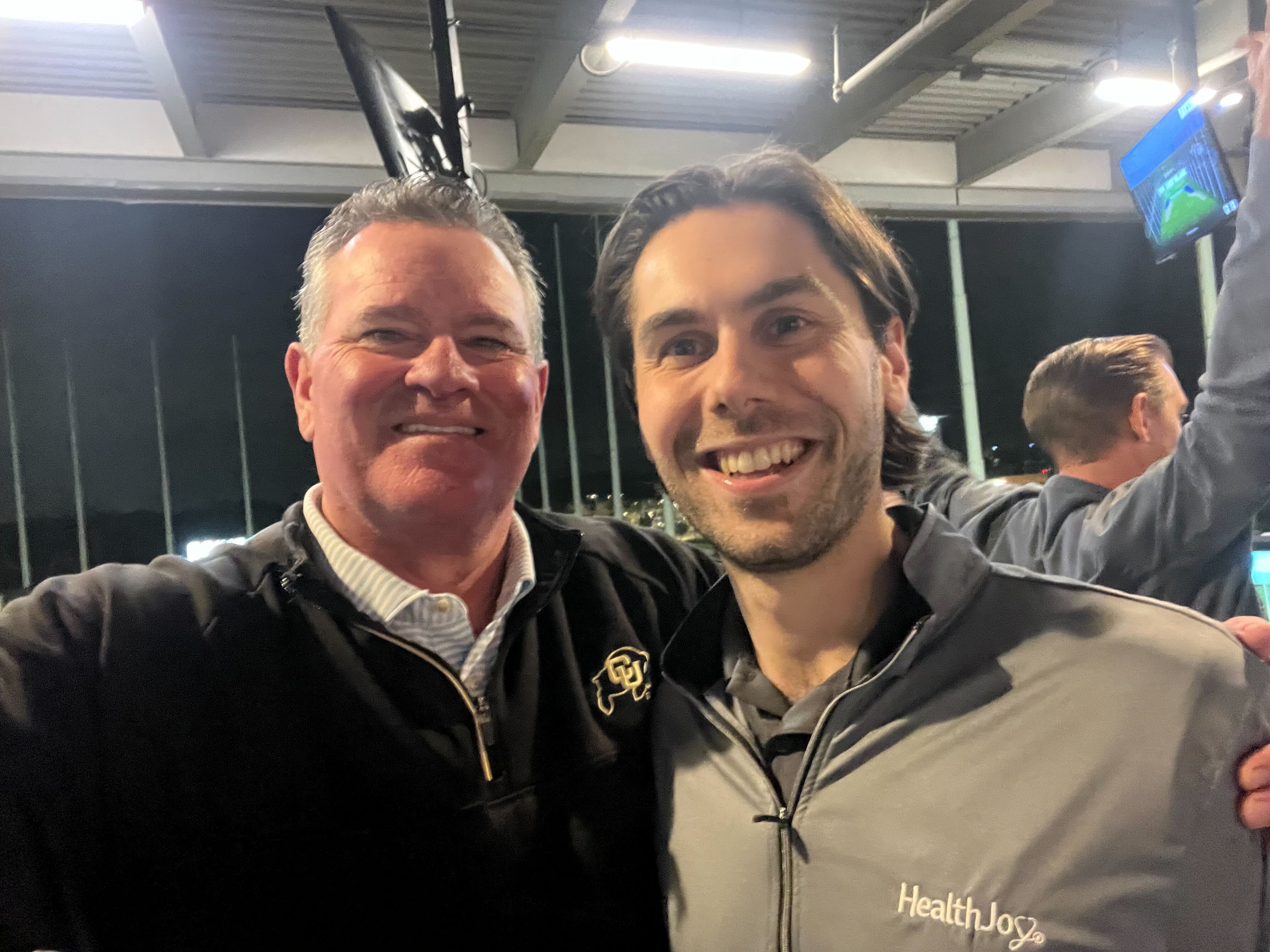 Two HealthJoy team members at a company event.