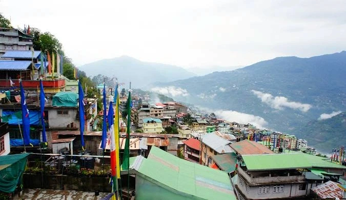 Hillside homes and prayer flags