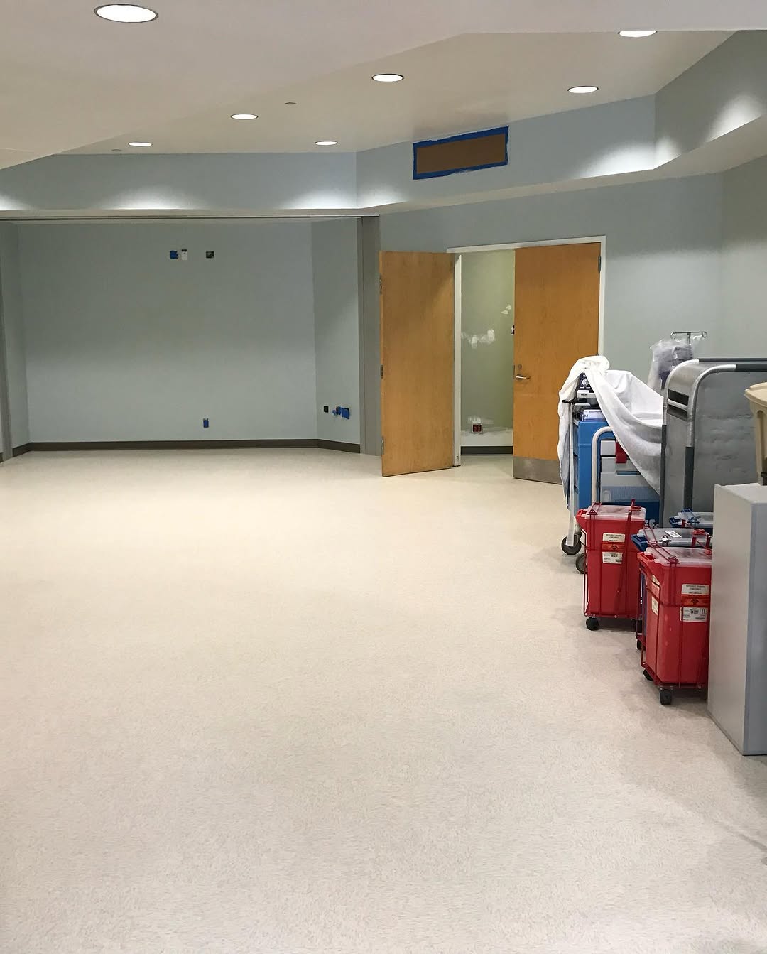 Finished light speckled VCT floor in a break room