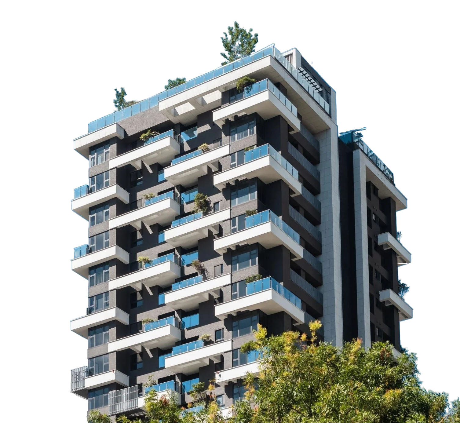 An apartment building with several floors with green trees in front