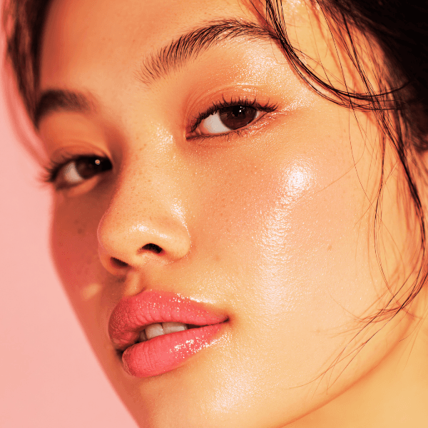 close up of woman with glowing skin