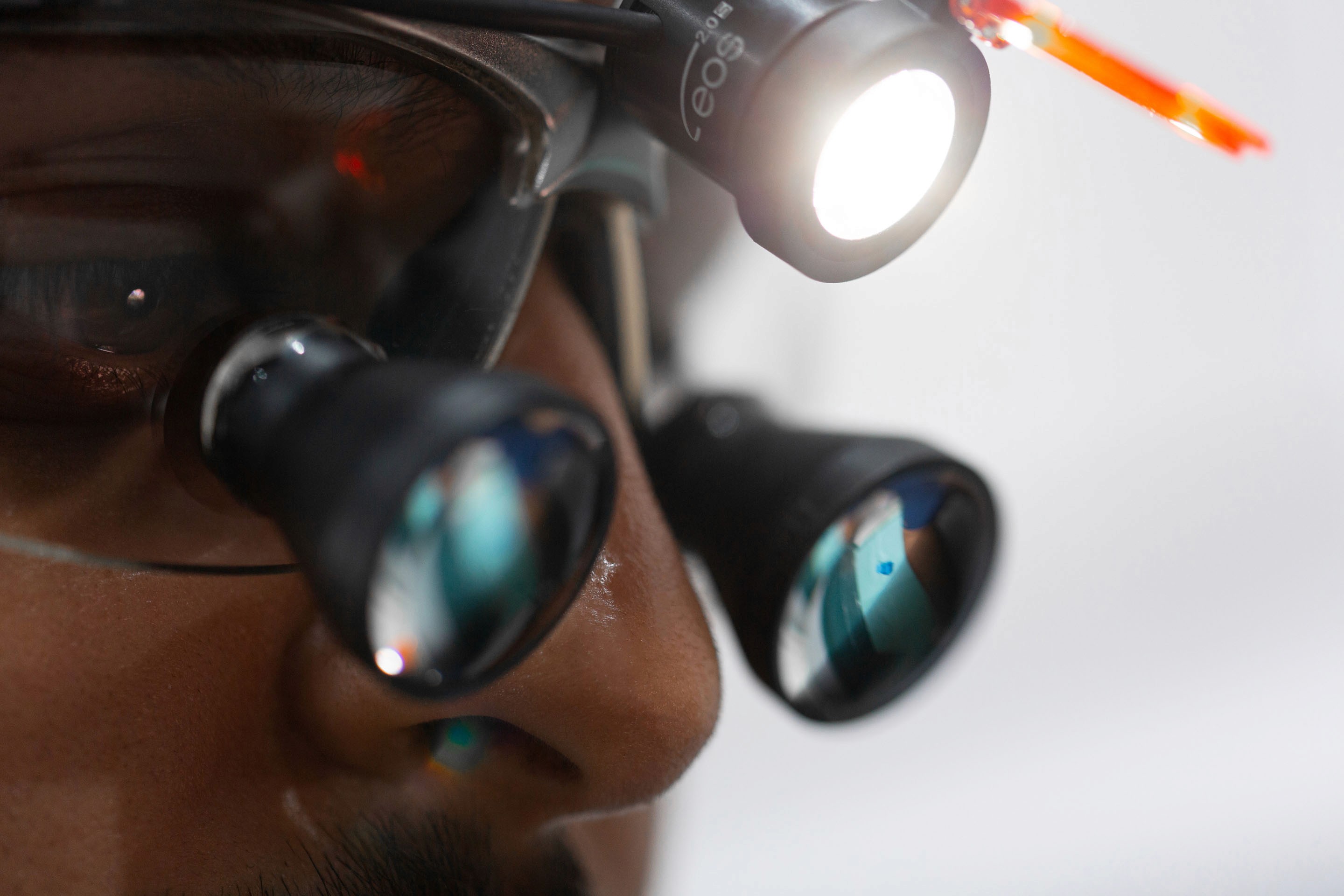 a close up of a woman's mouth with white teeth