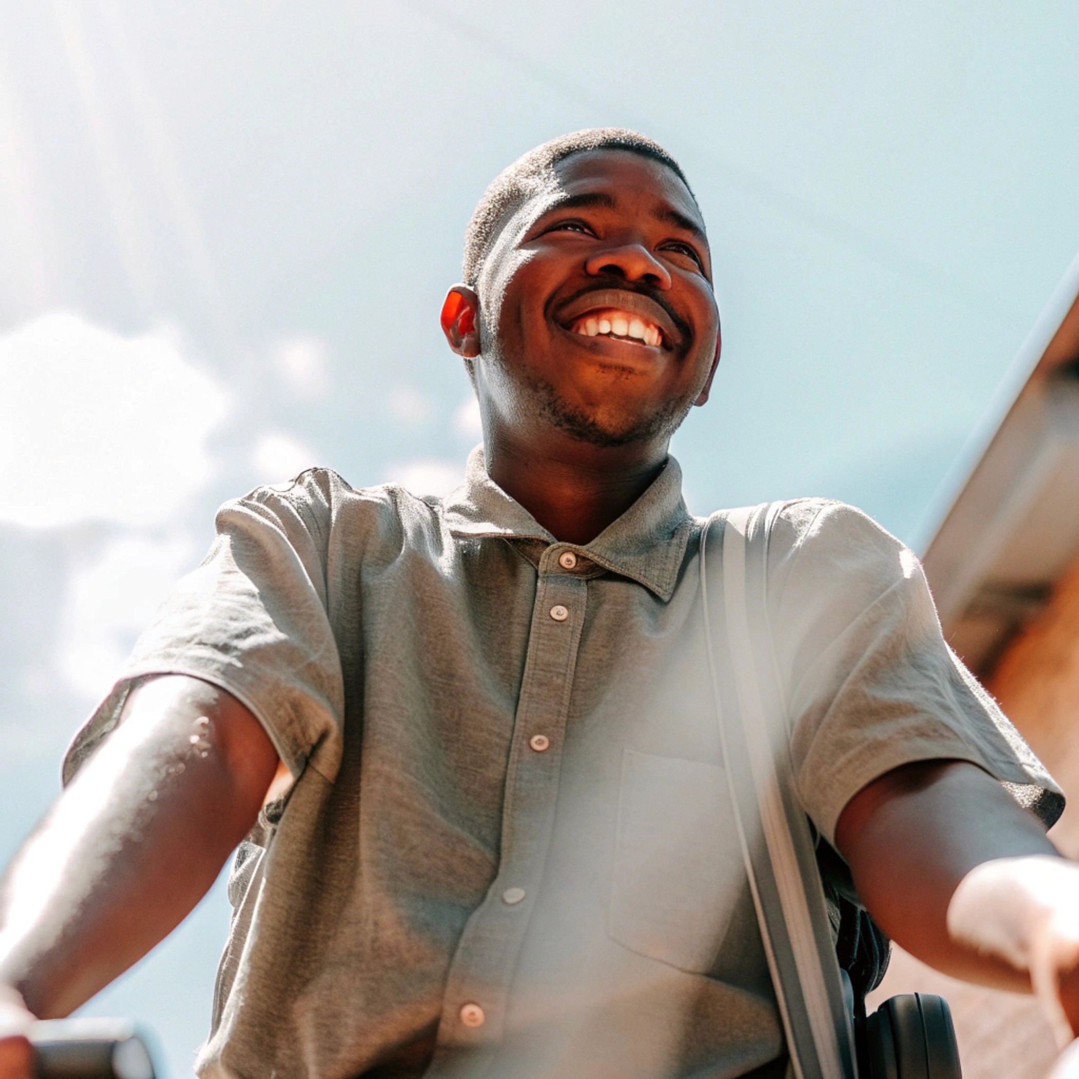 a young african male smiling