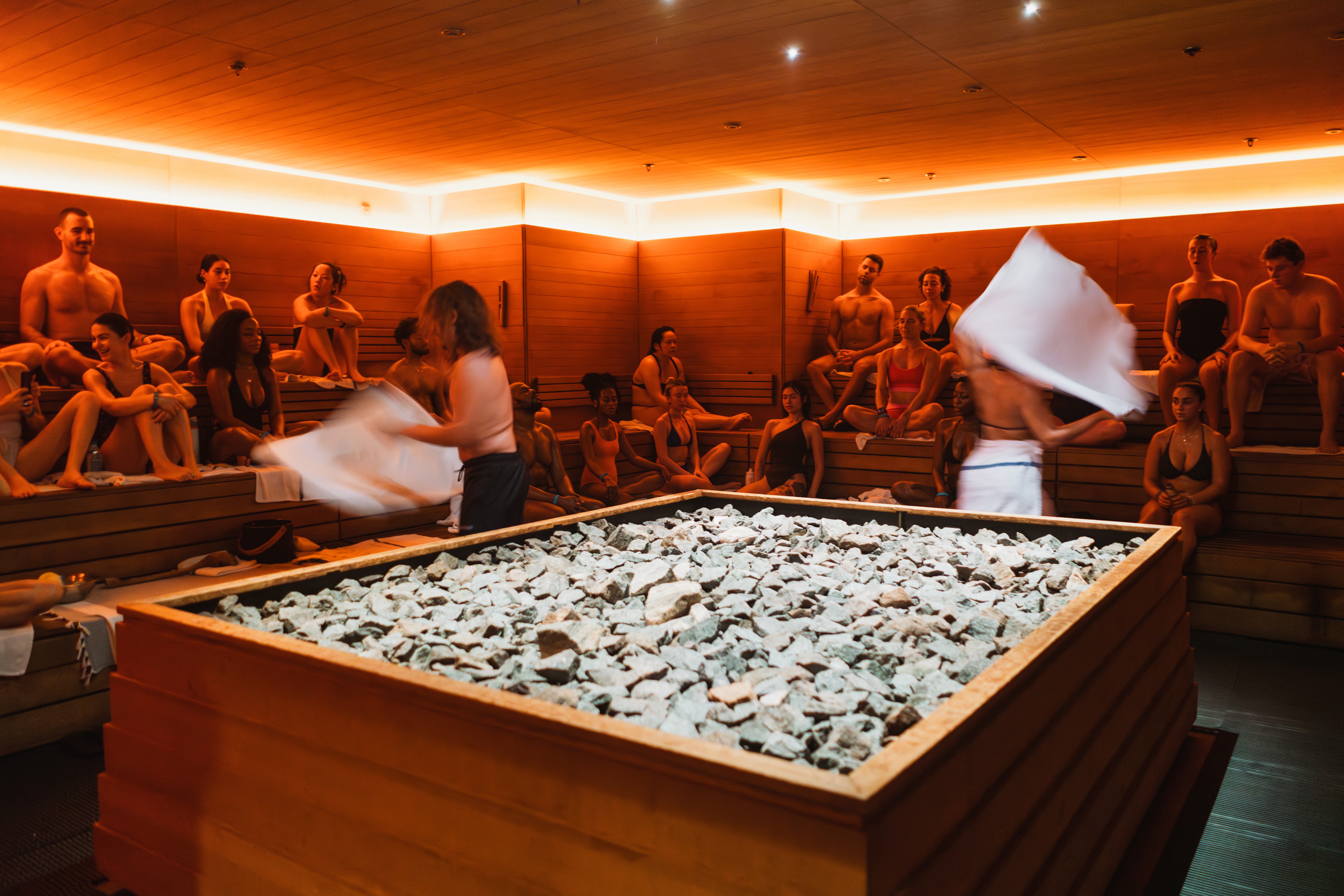 person playing audio mixer in concert