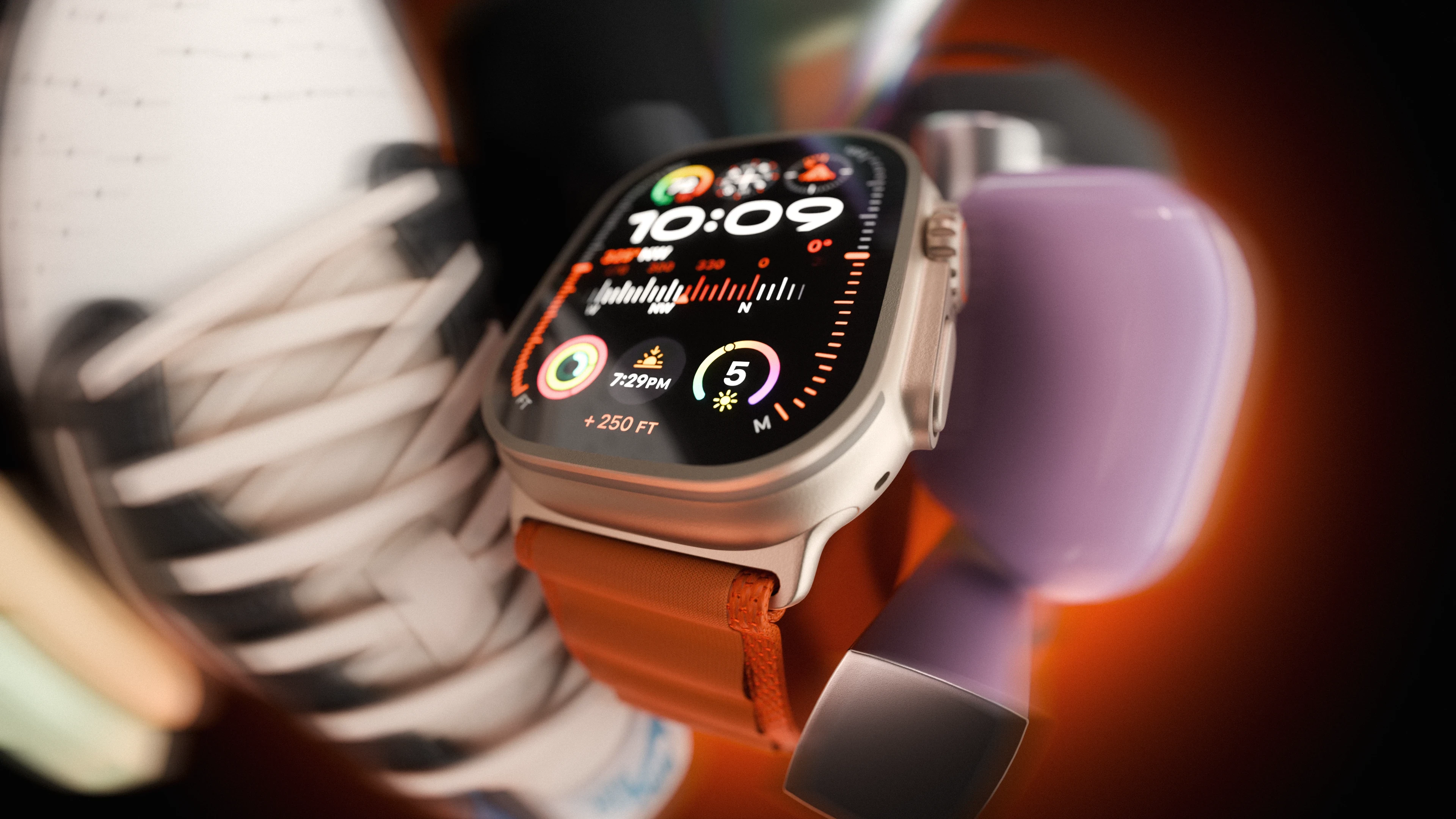 Apple Watch close-up with metallic band and glowing display
