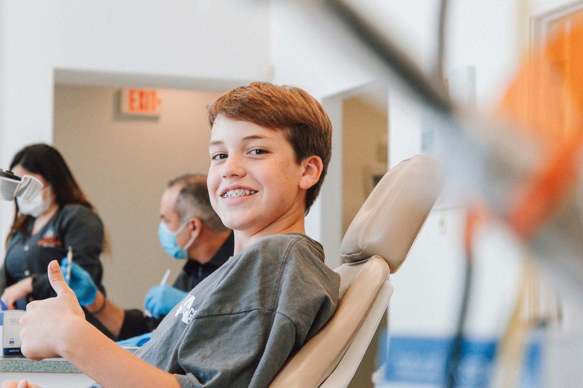 Tevreden kind bij tandarts.