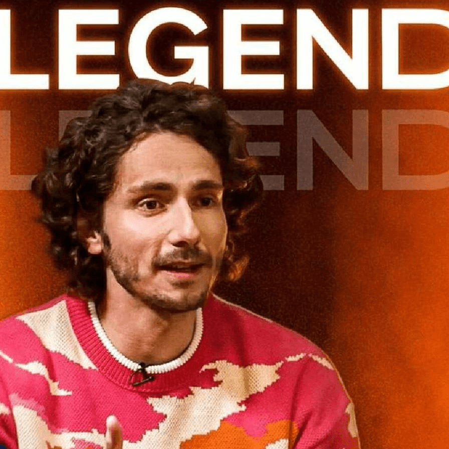 Bannière ou miniature de chaîne pour le média digital Legend. L'image présente un portrait rapproché et dynamique de Guillaume Pley (fondateur) portant un pull coloré à motifs nuages ou abstraits (rose, orange, blanc). L'arrière-plan est un dégradé de couleurs chaudes (orange et brun) et le mot 'LEGEND' est répété en grande typographie néon blanche et lumineuse en arrière-plan. Cette miniature est conçue pour la promotion de la chaîne d'interview/podcast, mettant en évidence la direction artistique audacieuse et le branding visuel impactant réalisés par Nux-Studio pour le média de divertissement.