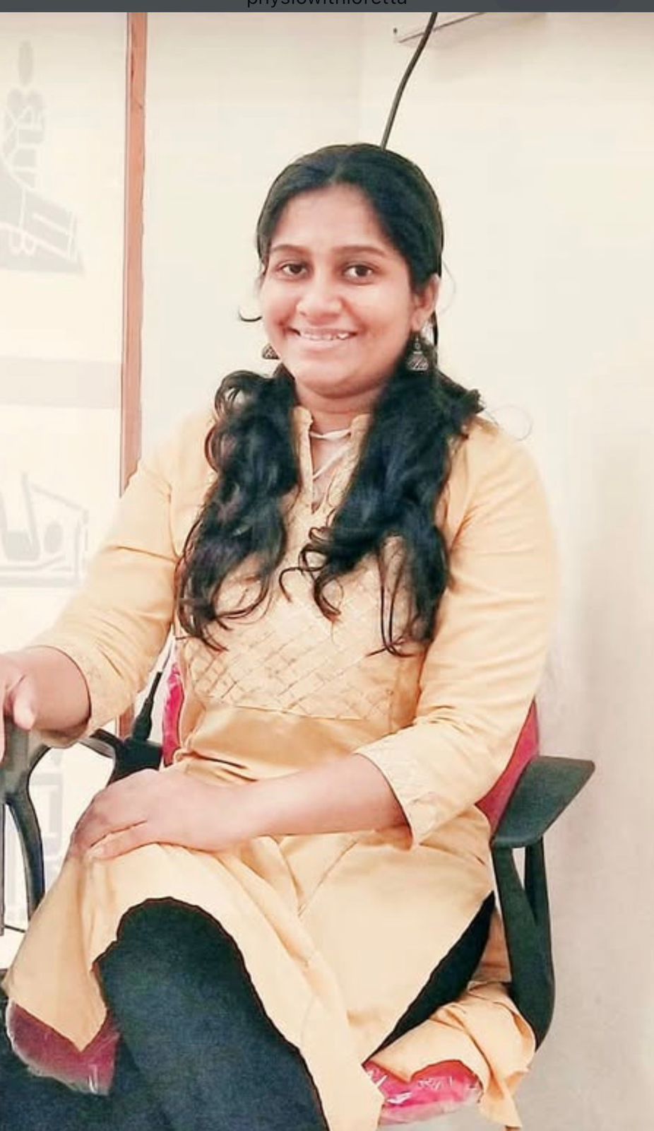 A person wearing the white shirt looking at the left