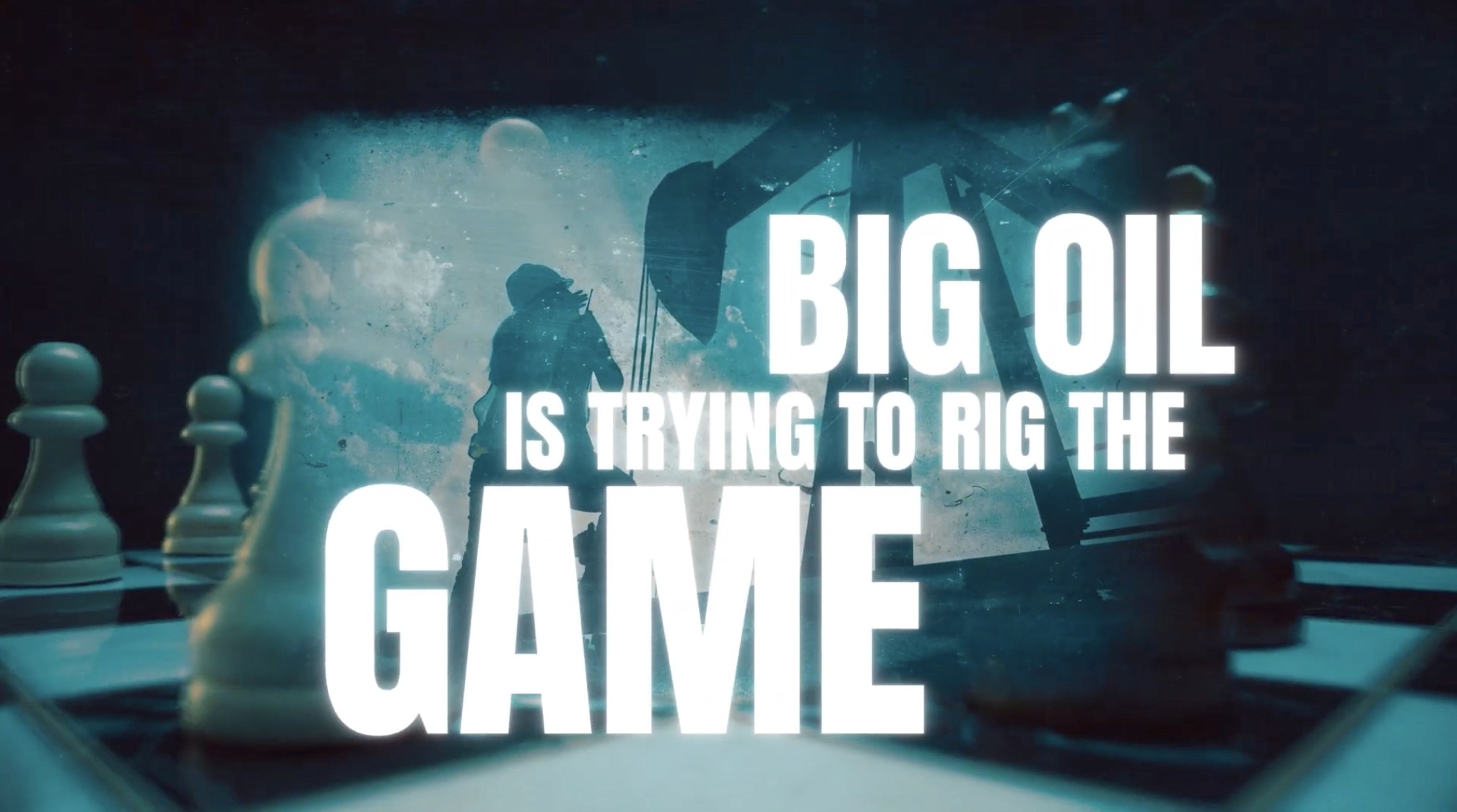 A stillframe of a television ad that reads "Big Oil is trying to rig the game."