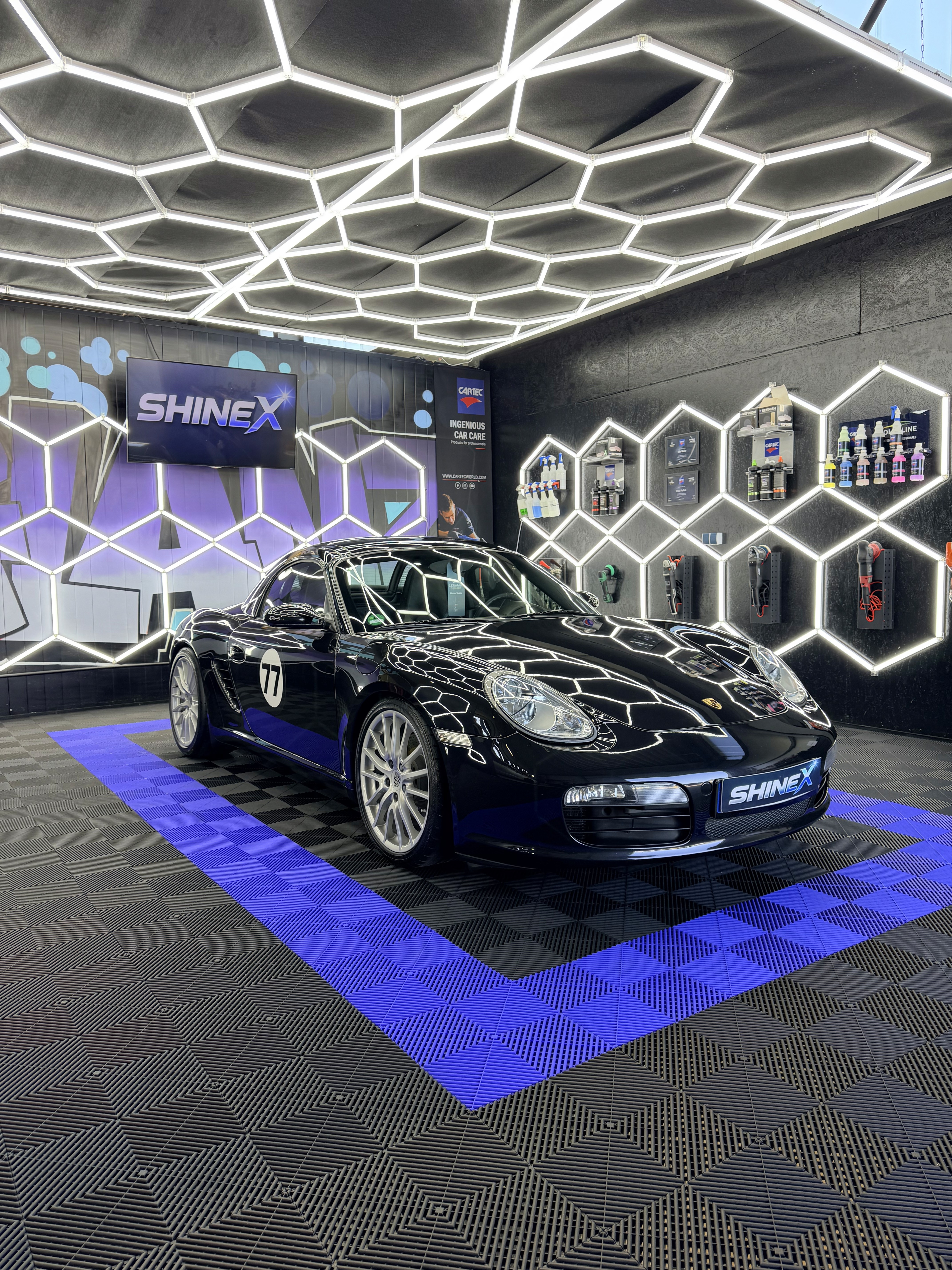 Black BMW M8 with mirror gloss finish inside ShineX studio