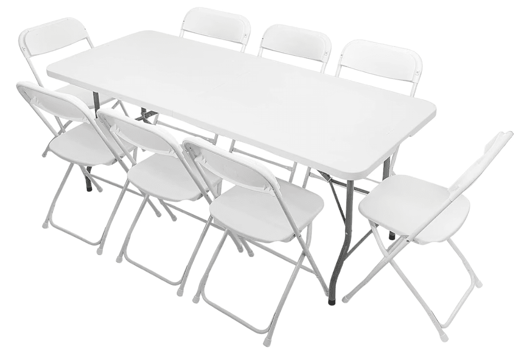 Image of a long rectangular table with foldable chairs around it.