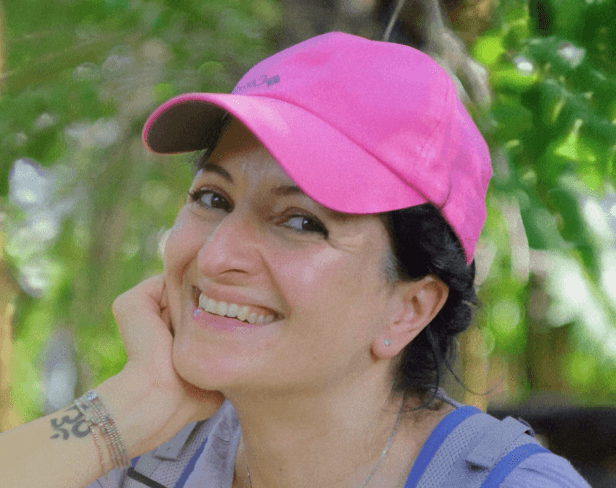 man sitting on a armchair beside window