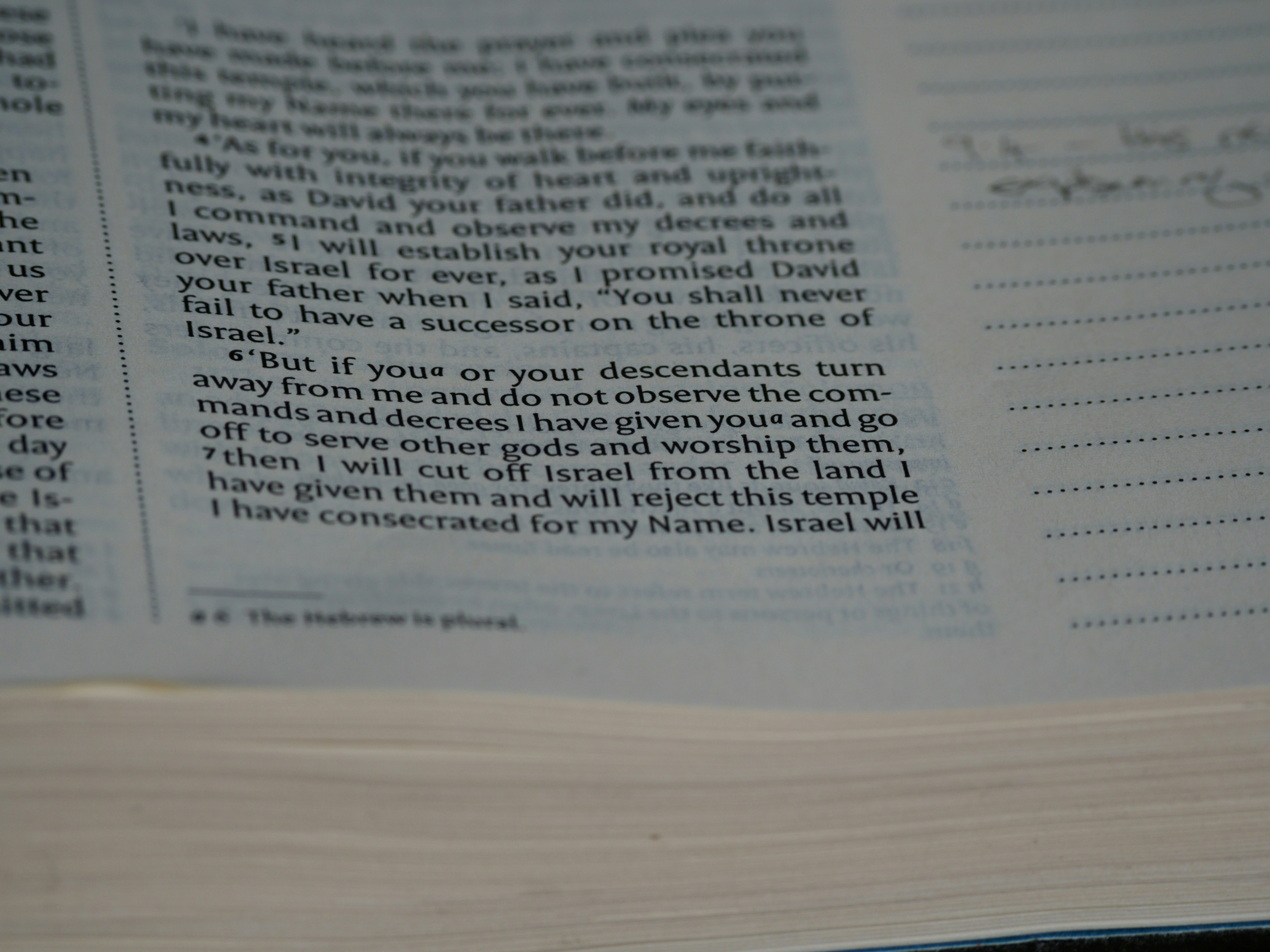 white printer paper on brown wooden table