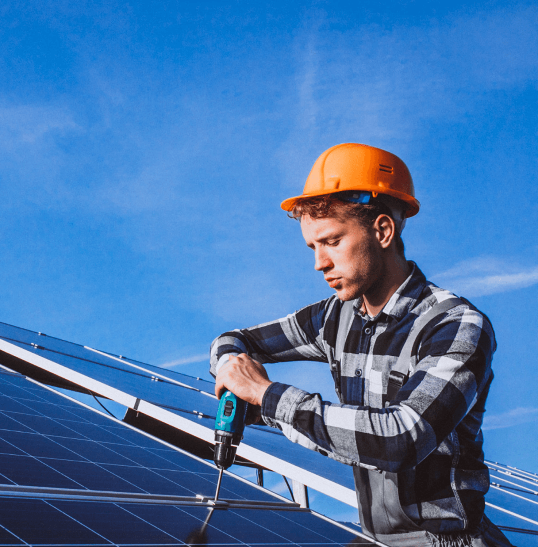 Technician performing solar panel repair on a rooftop array