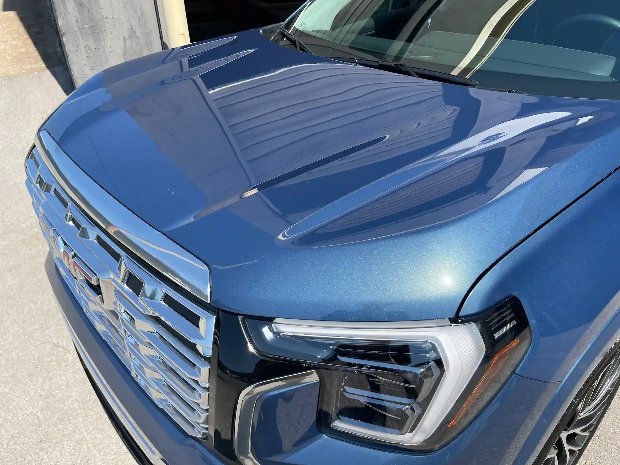 Blue GMC Denali after detailing and paint correction in Kansas City