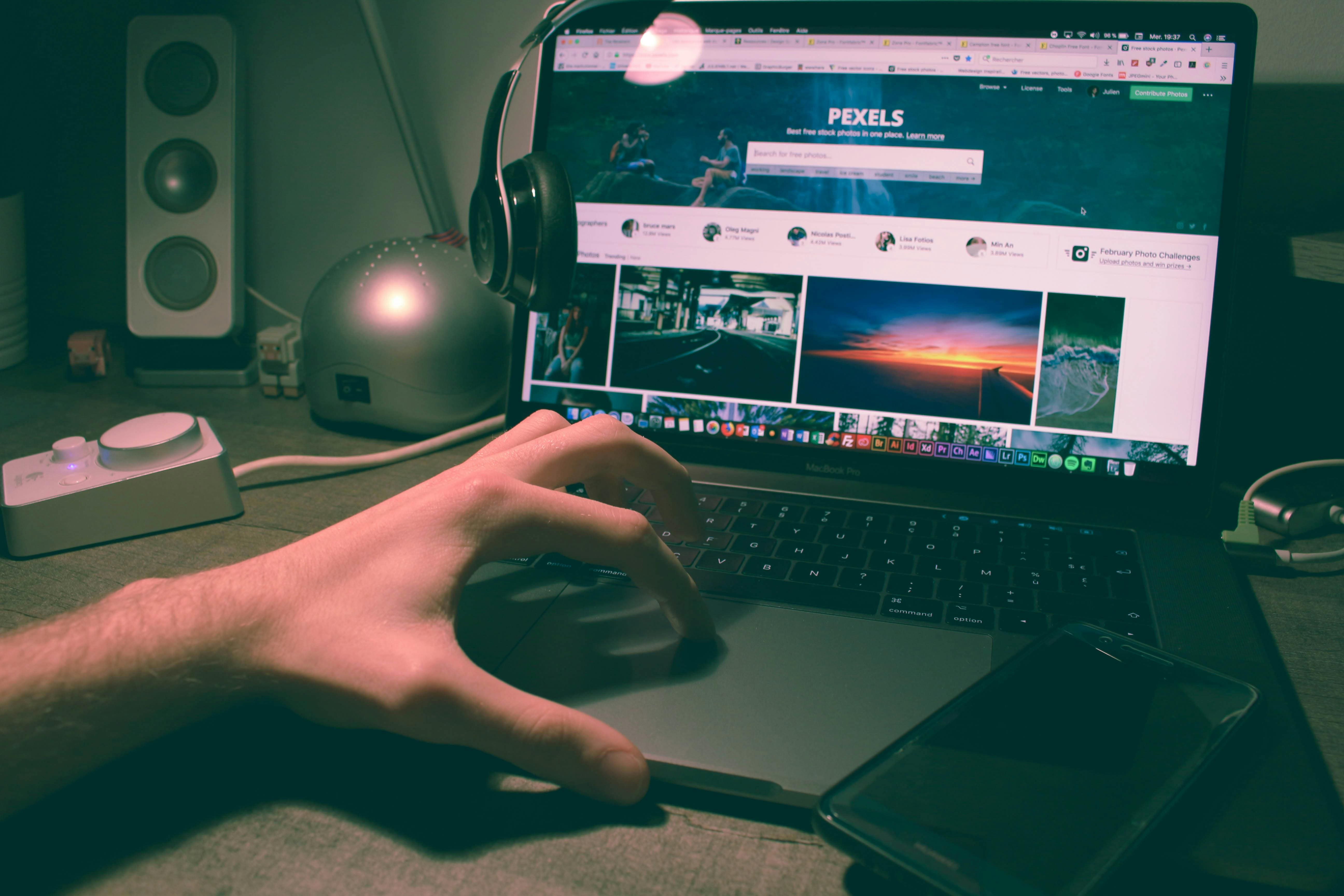 a person sitting in front of a computer screen