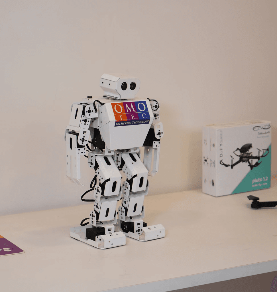 Young girl with backpack walks on dirt path