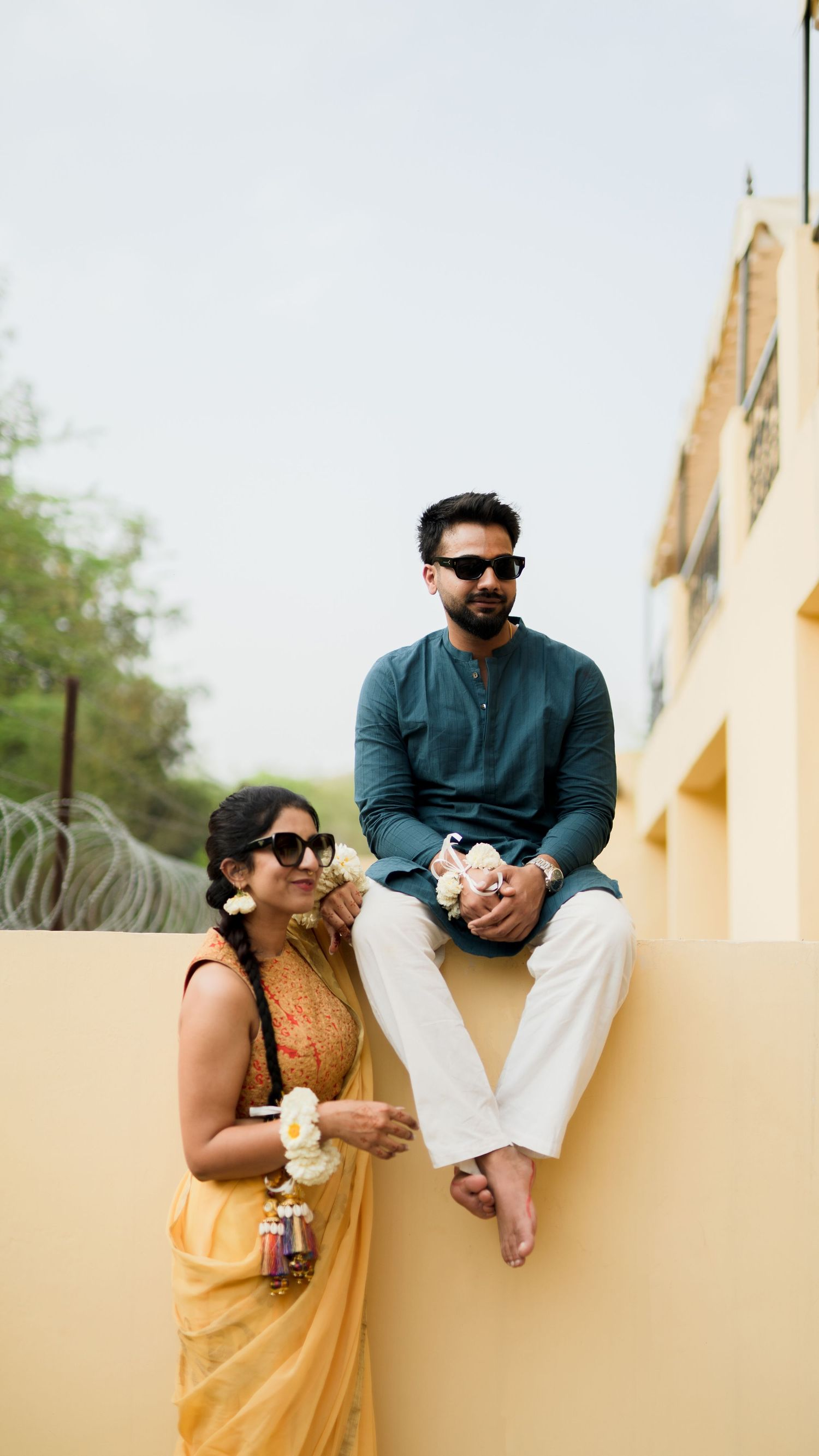 indian couple haldi ceremony candid moment pre wedding outdoor photography