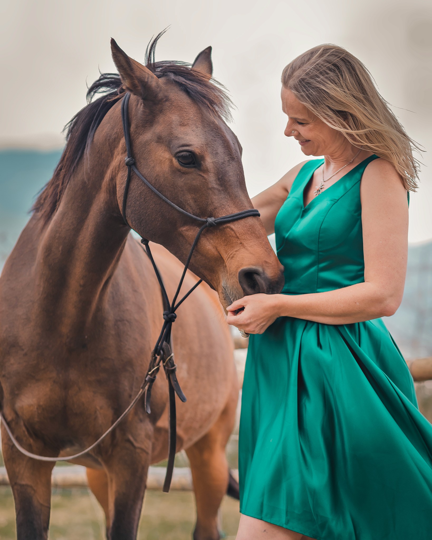 Horse and Christina in serene nature, showcasing horse-guided empowerment for personal development coaching.