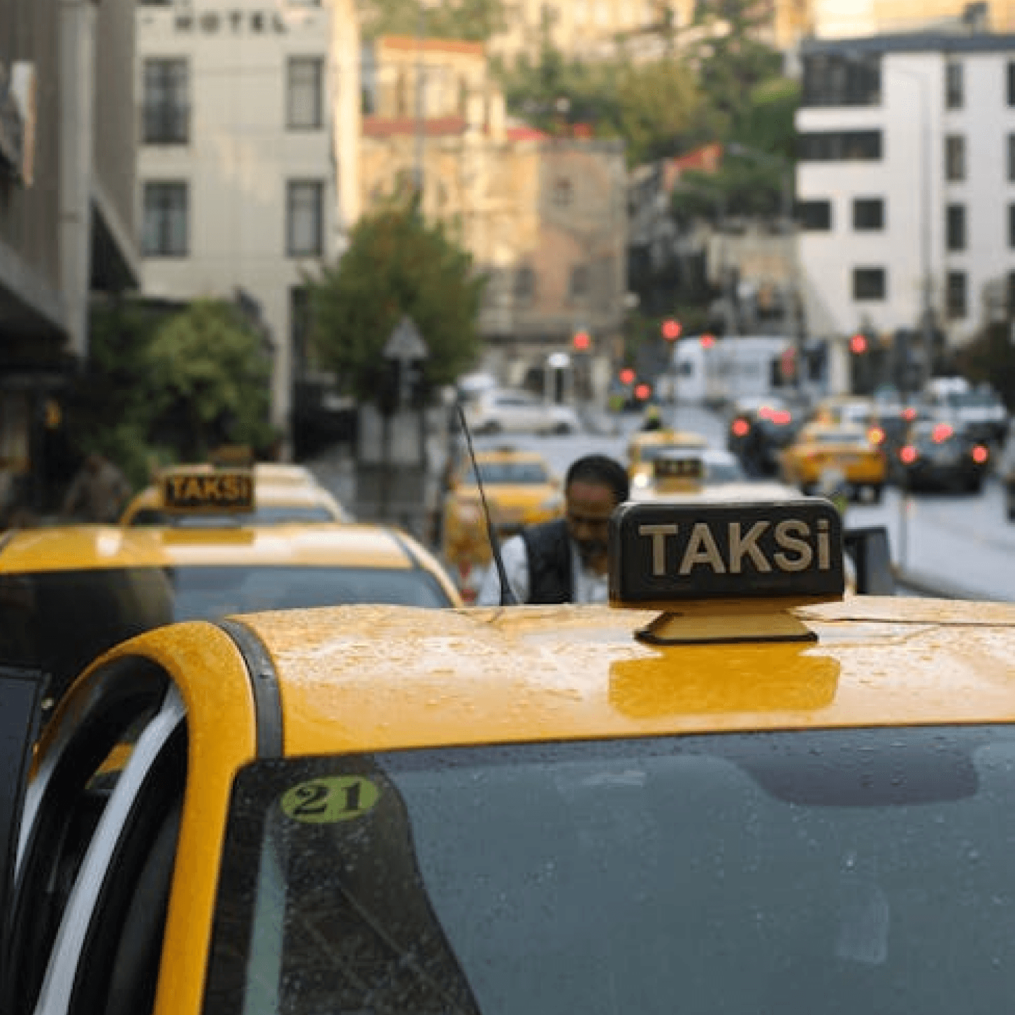 two people looking at a tablet and smiling