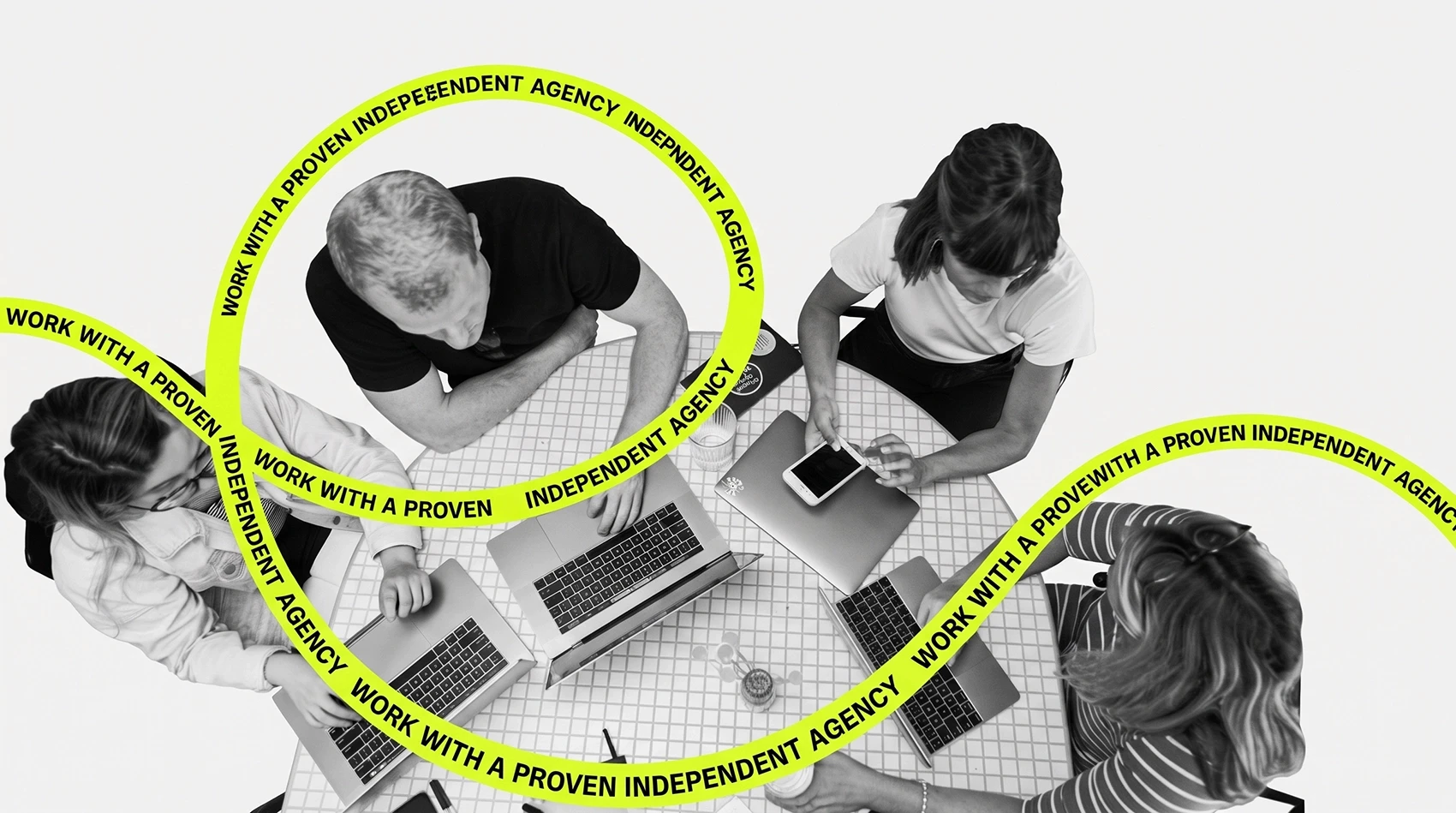 Mediareach Advertising independent agency team collaborating on round table