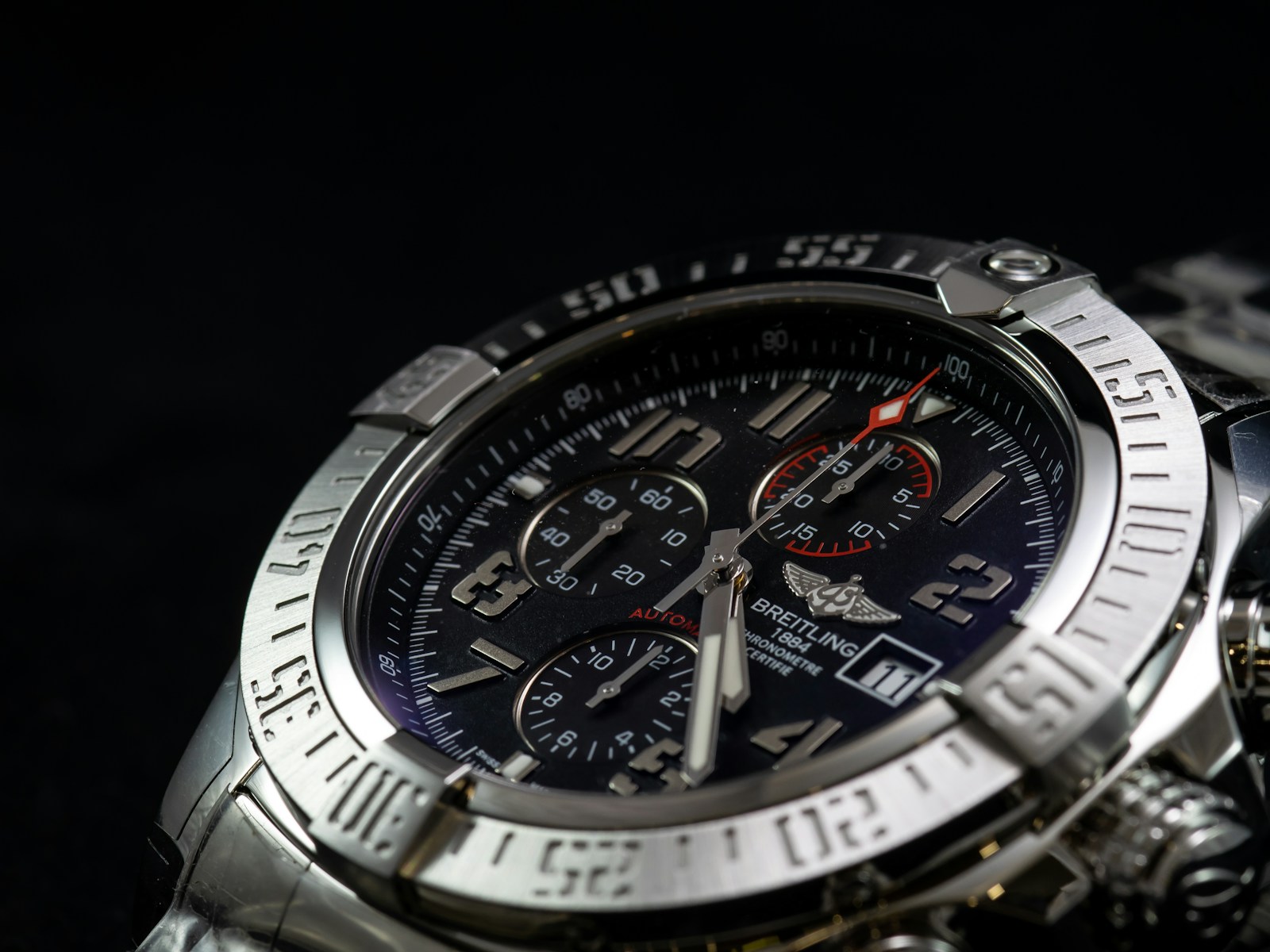 Round silver chronograph watch