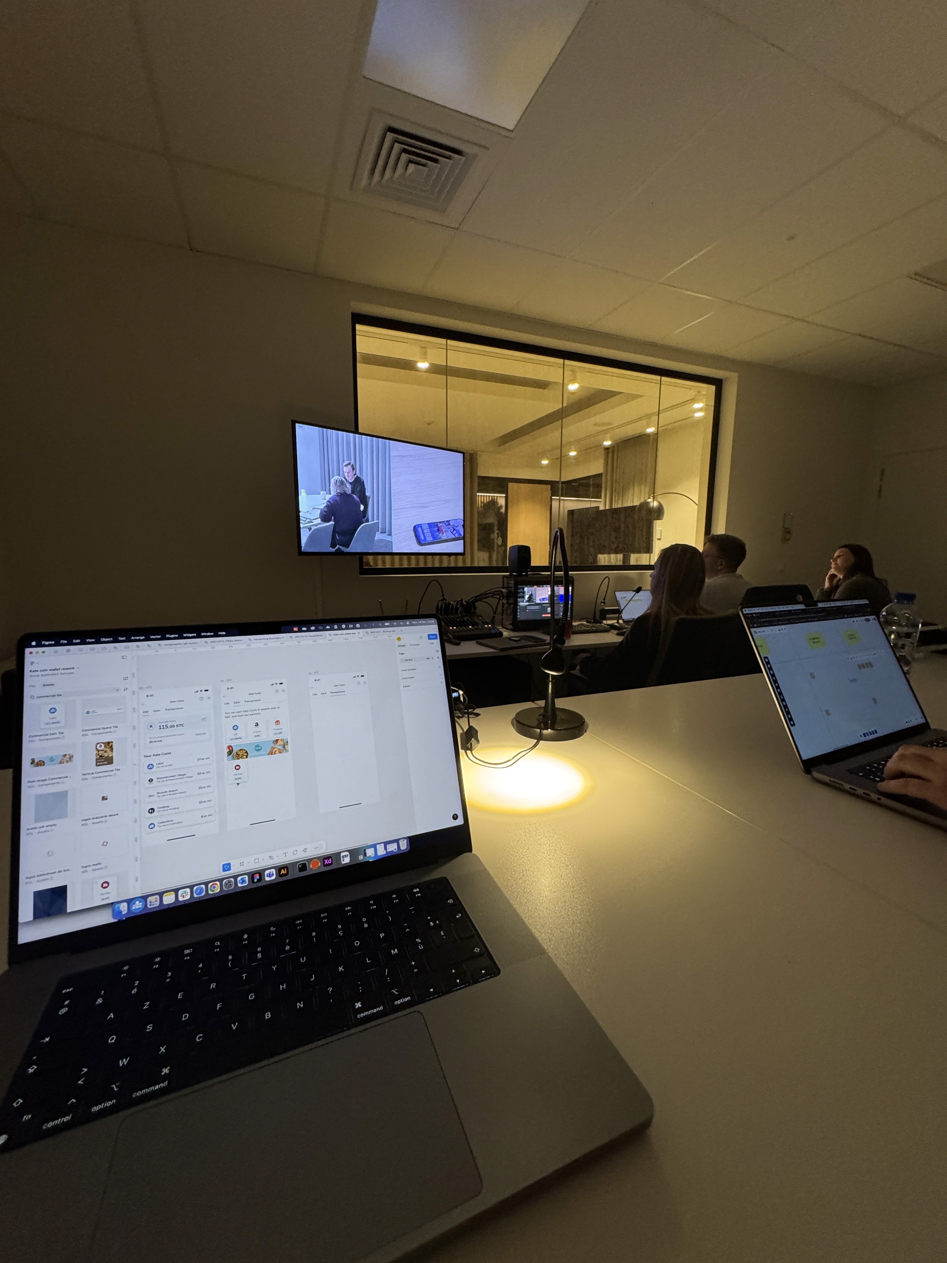Person sitting on a ledge overlooking New York City skyline