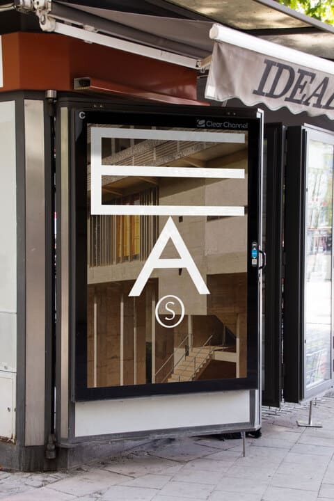 A vinyl of EAS logo in a glass door.