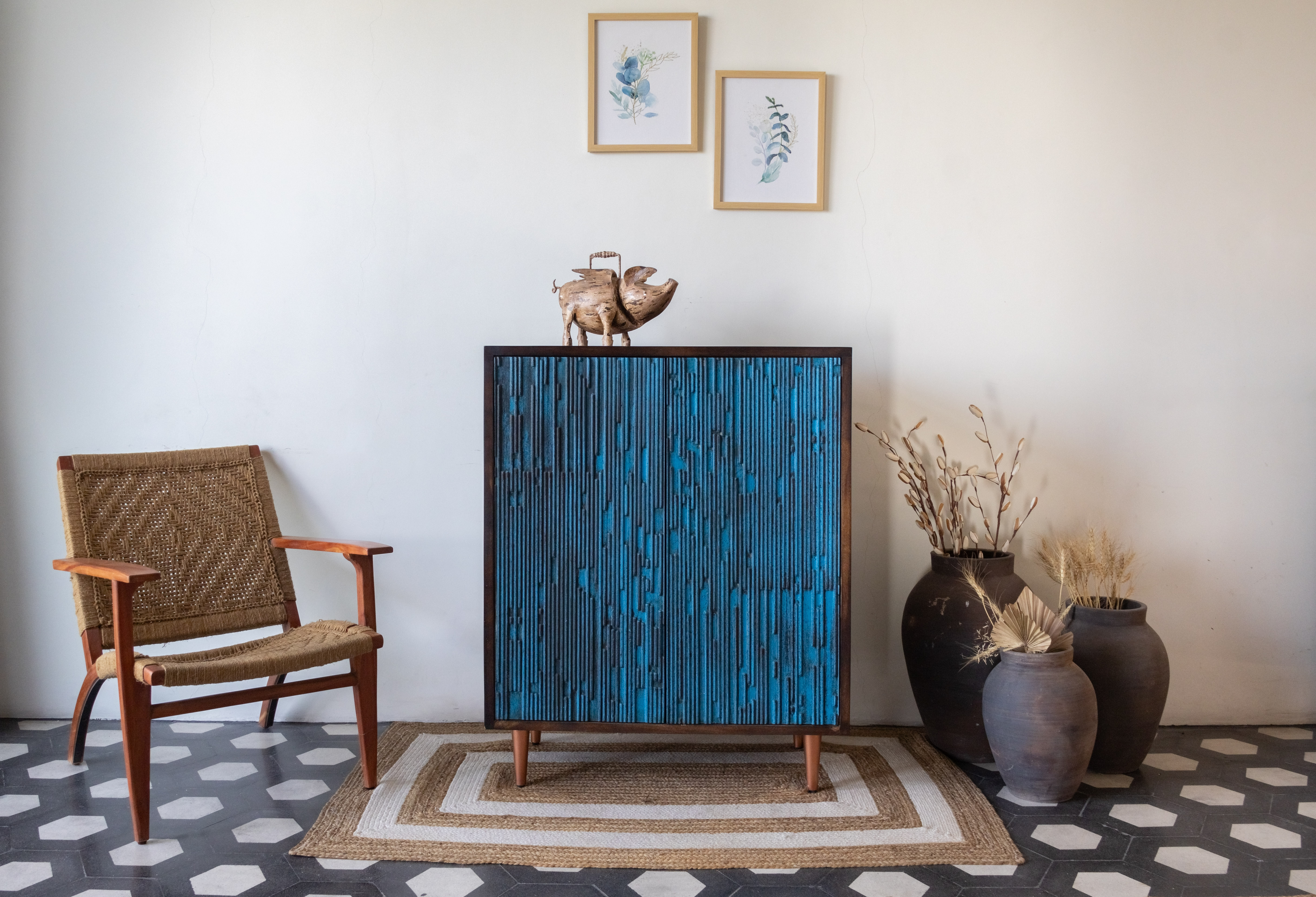 West India International Elysian collection made with deep blue tone of wood and chrome finished elements