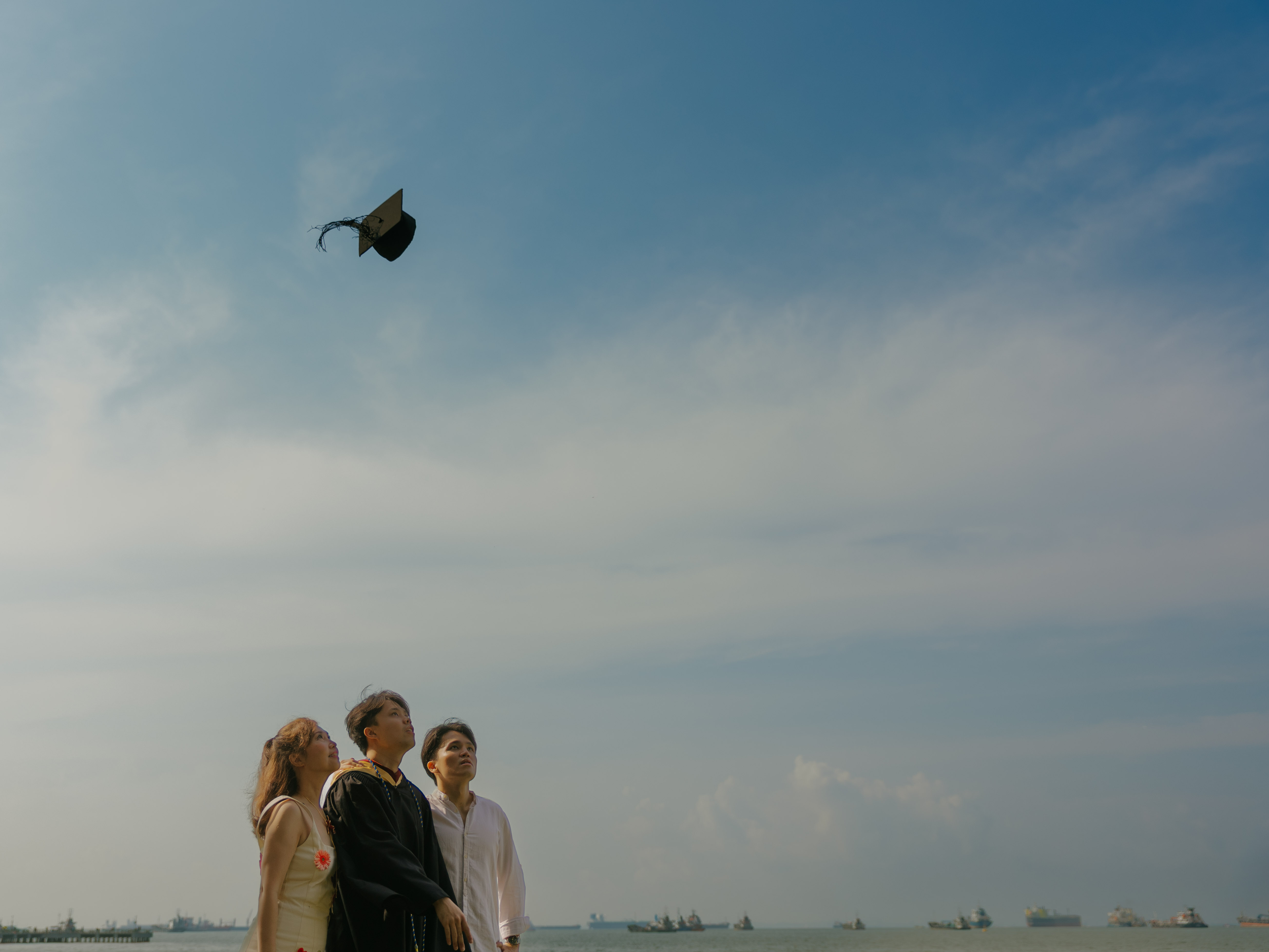 Graduation family portrait photography in Singapore outdoor session by JIREHTAKESPHOTOS