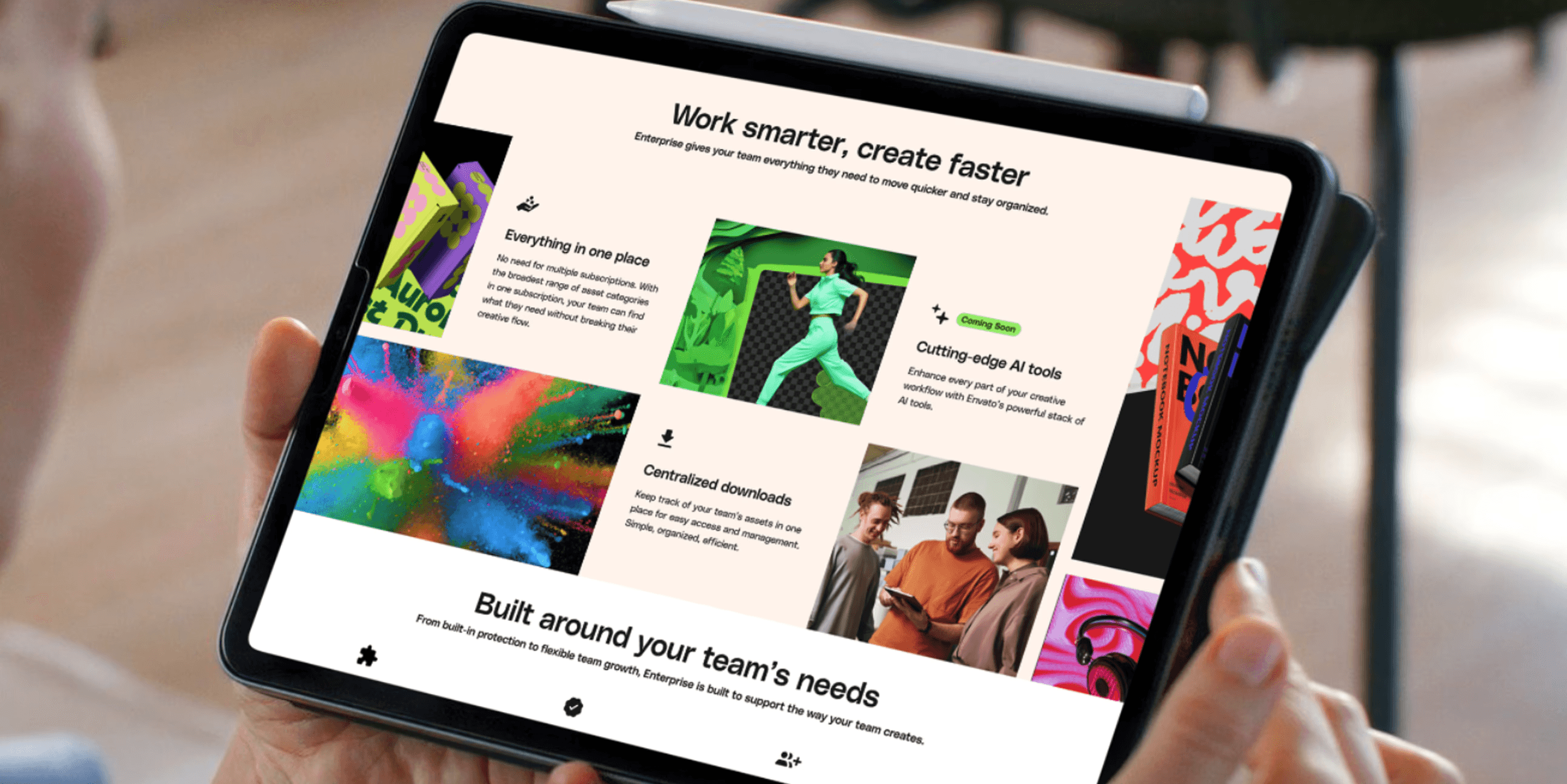 Close-up of the Envato Enterprise landing page displayed on a tablet, showing feature sections and visual content.