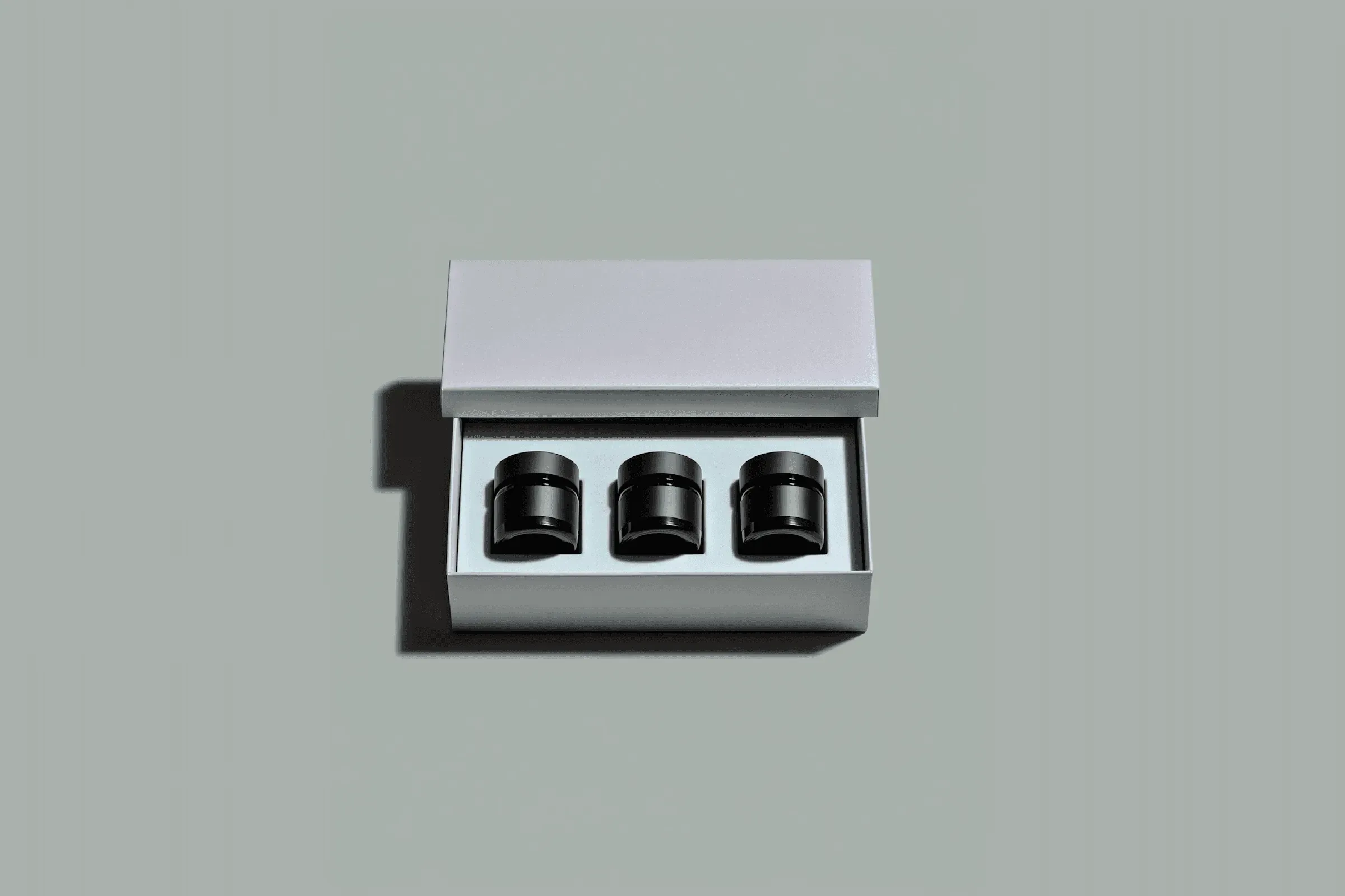 A set of three jars in a box