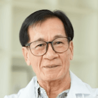 Headshot of asian male doctor.