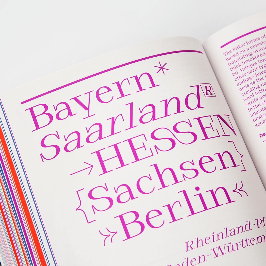 photo of a design book spread featuring Samzara in bright pink on white