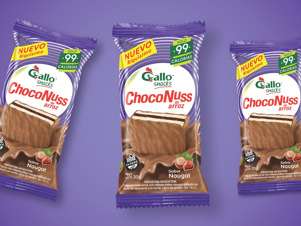 Rooftops of a coastal town with the sea in background