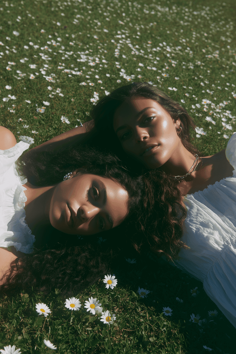 a person sitting on a couch with a laptop
