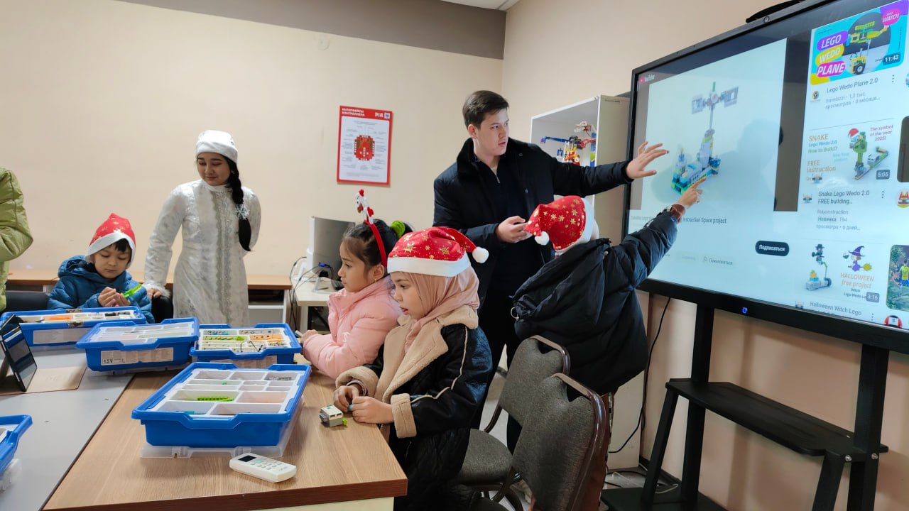 A man stading with Surfboard