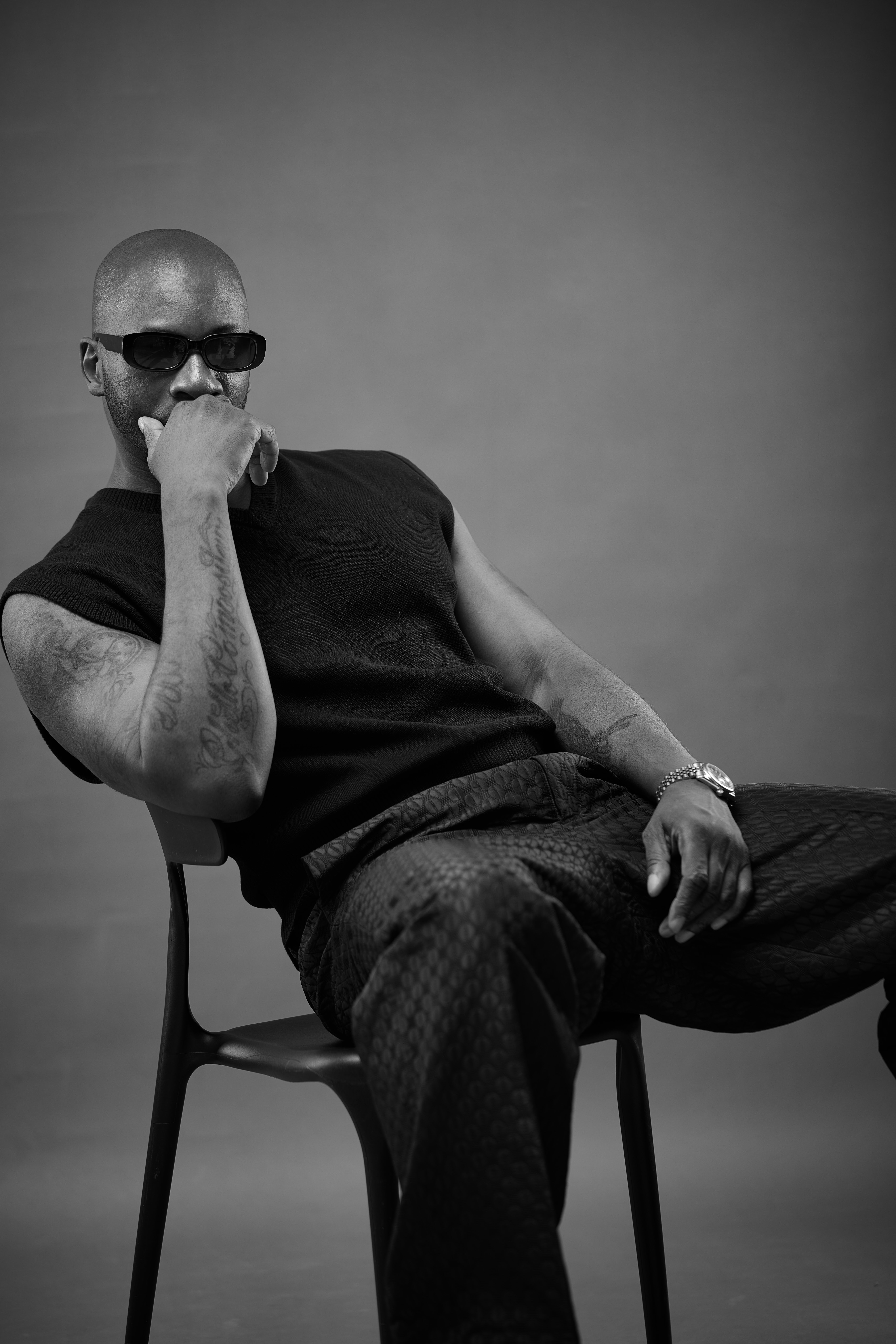 Music producer sitting in his studio