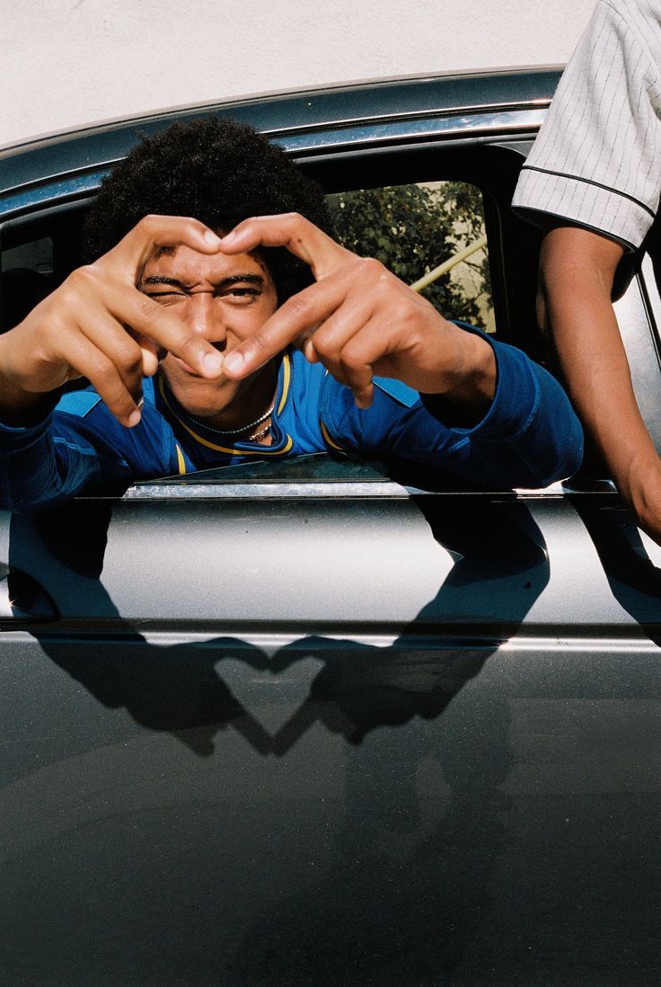 men's washed denim jacket riding a skateboard