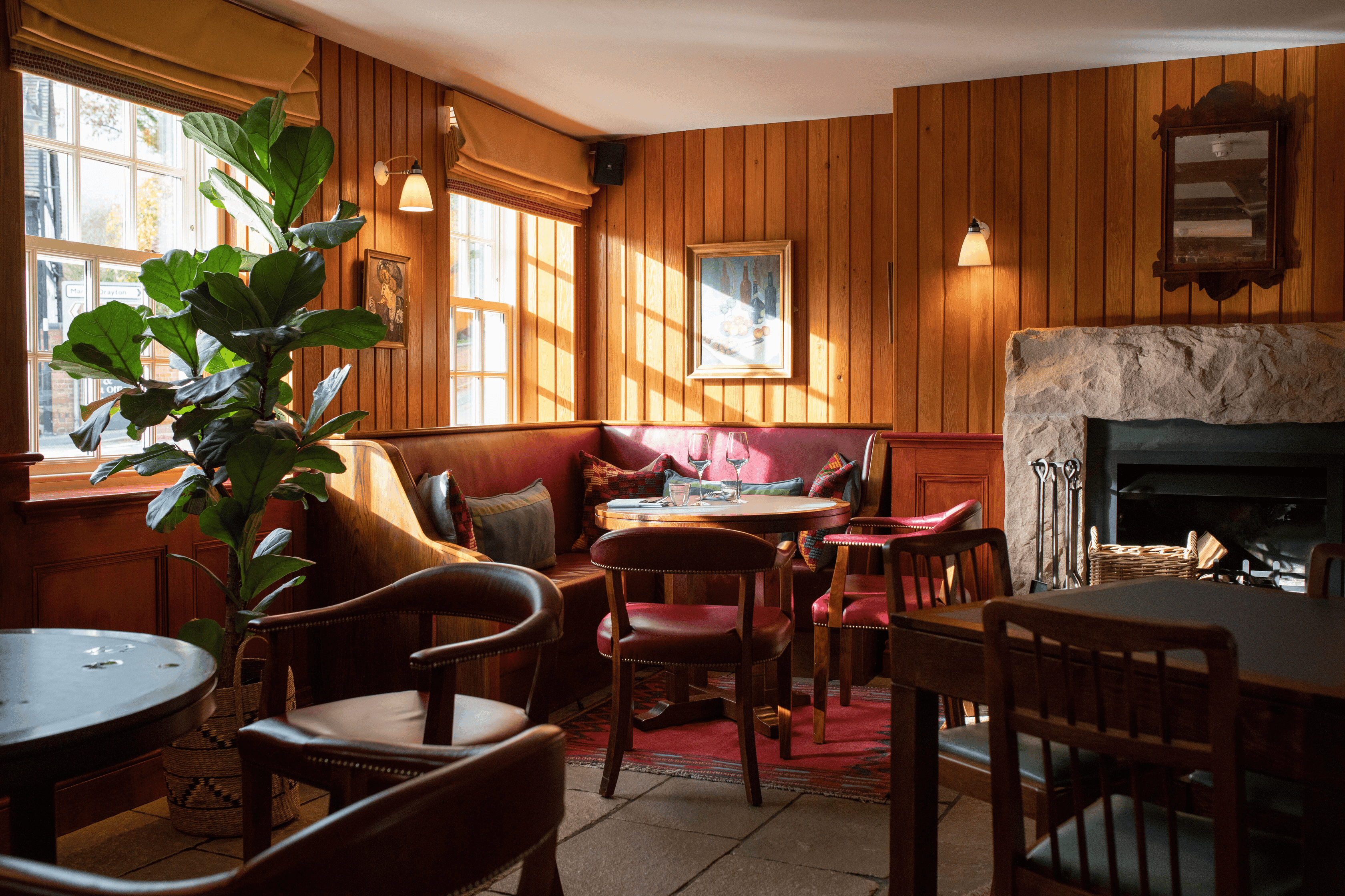 The Bear Inn pub dining area refurbishment with timber wall panelling, booth seating and heritage joinery