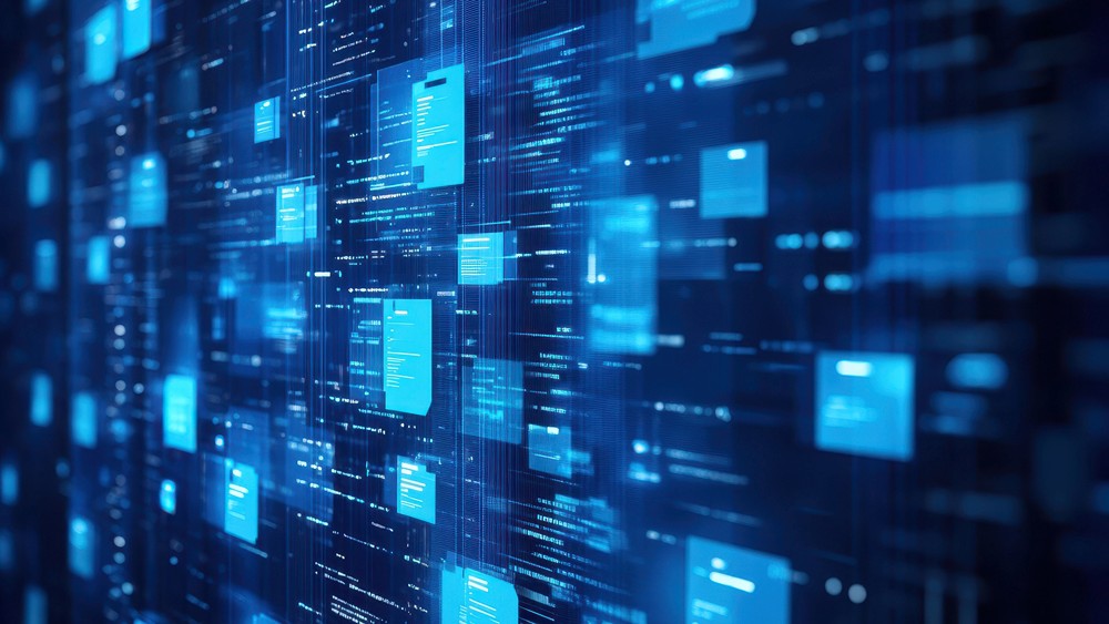 Red digital warning symbol glowing on a circuit board interface, representing active ransomware exploitation of the VMware ESXi CVE 2025 22225 vulnerability and hypervisor compromise.