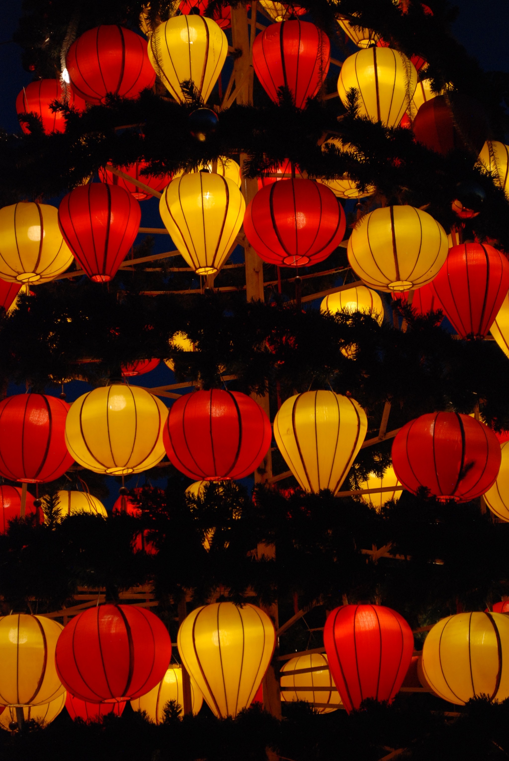 Image of a bed with a cup of coffee sitting on it
