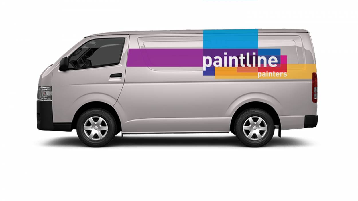 Image of van with branding across it