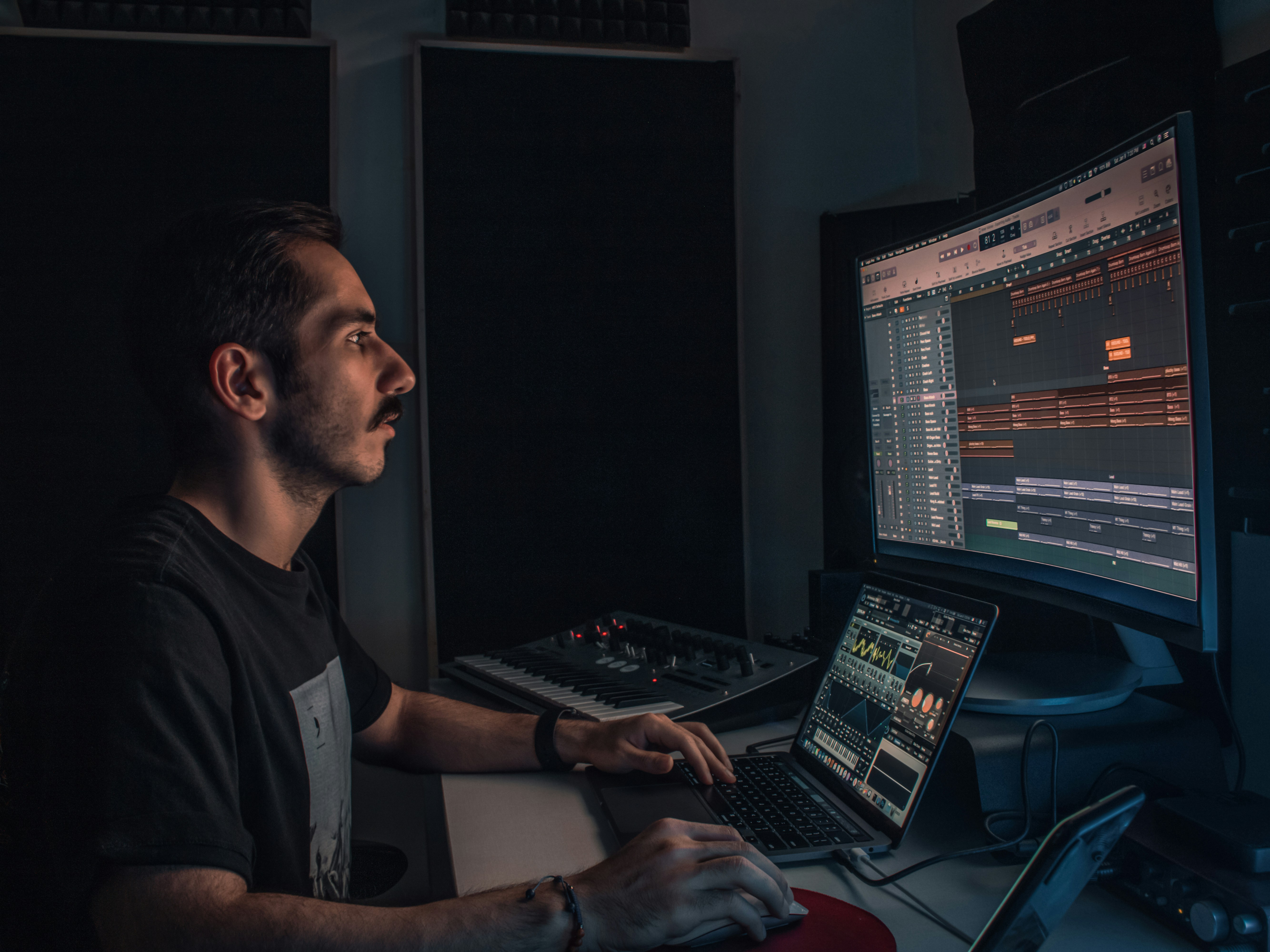 man in his studio - How To Learn Music Production  