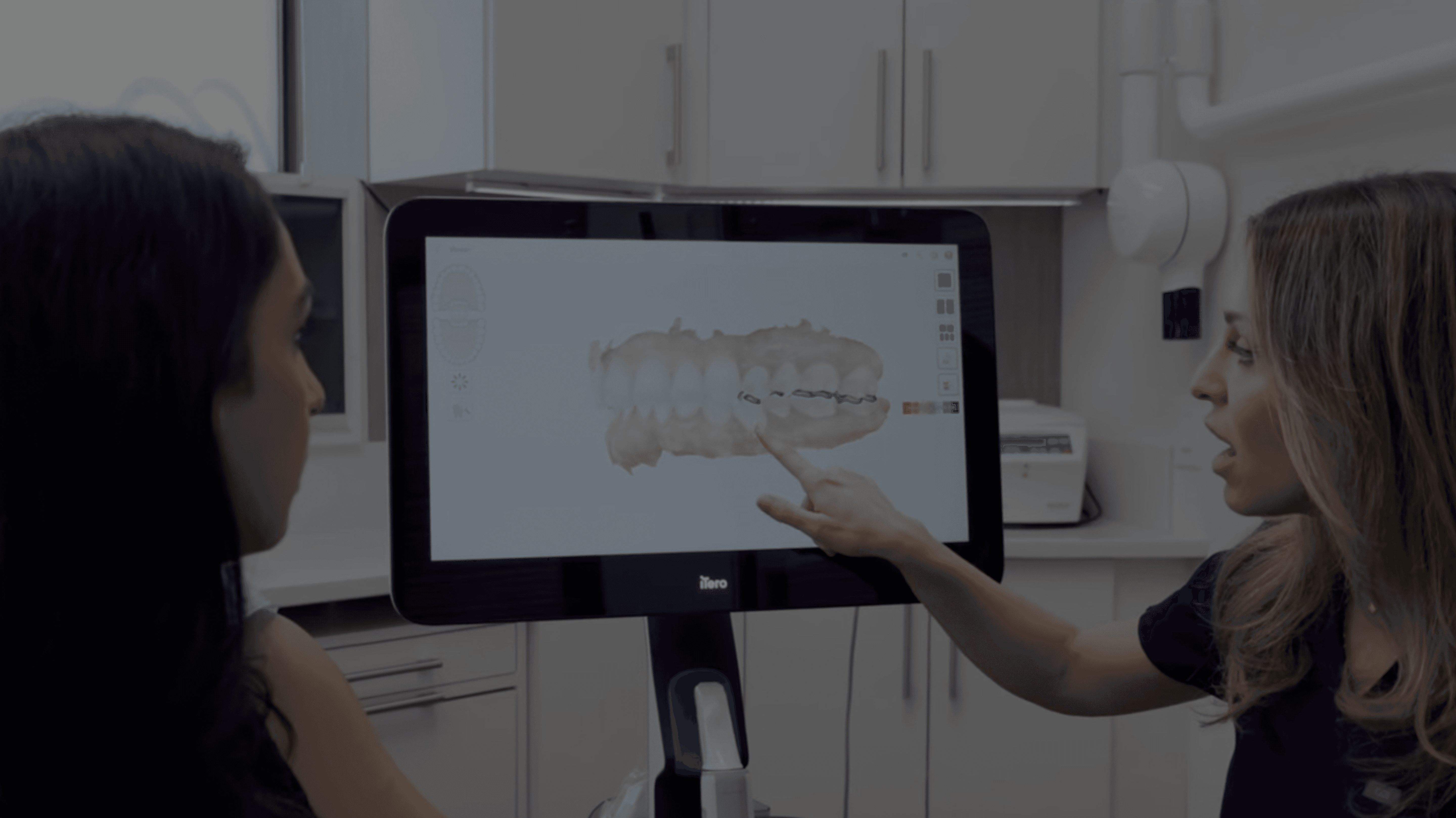 Dr. Isabel Cumandra explaining teeth xray results to patient at ScarboroSmiles Dental Clinic in Scarborough, ON | Best dentist in Scarborough.