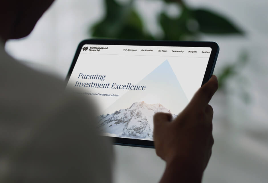 A person holding a tablet displaying a financial website with the headline Pursuing Investment Excellence and snow-capped mountains, reflecting brand authenticity to connect with customers seeking financial growth.