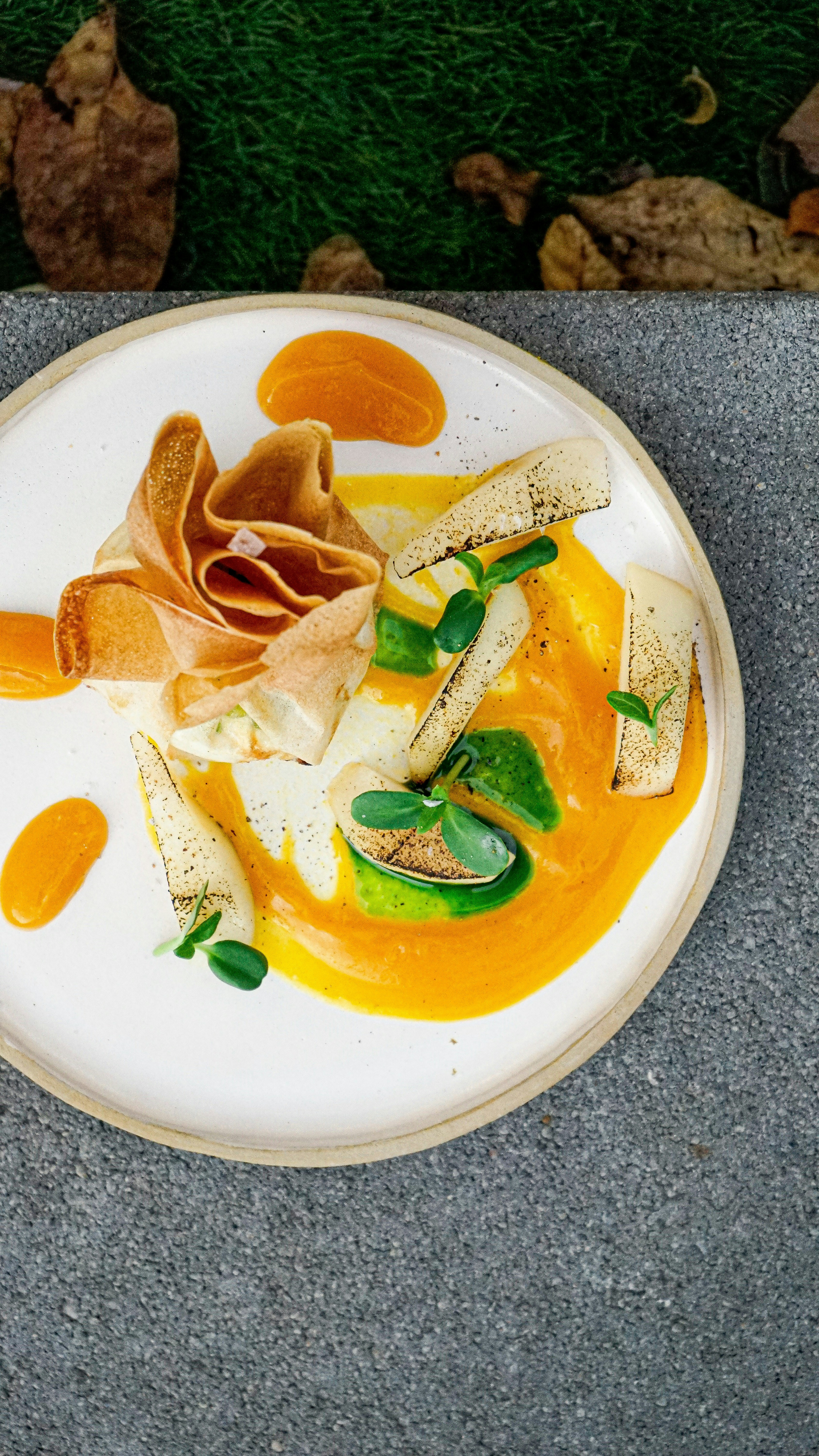 a white plate topped with food on top of a table